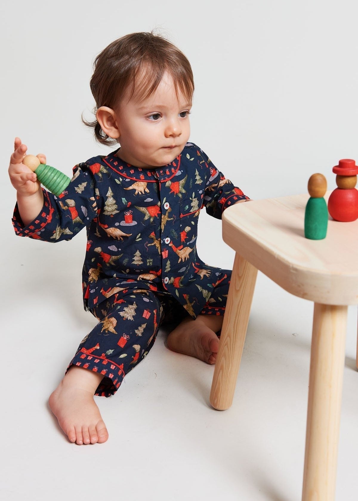a jurassic christmas - organic cotton baby pyjama set - Kutti Lulu