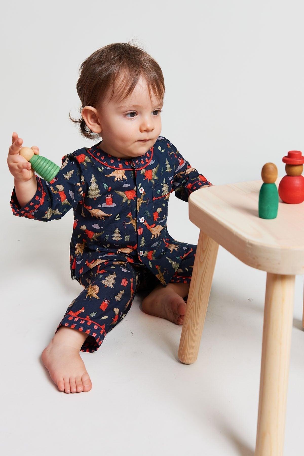 a jurassic christmas - organic cotton baby pyjama set - Kutti Lulu