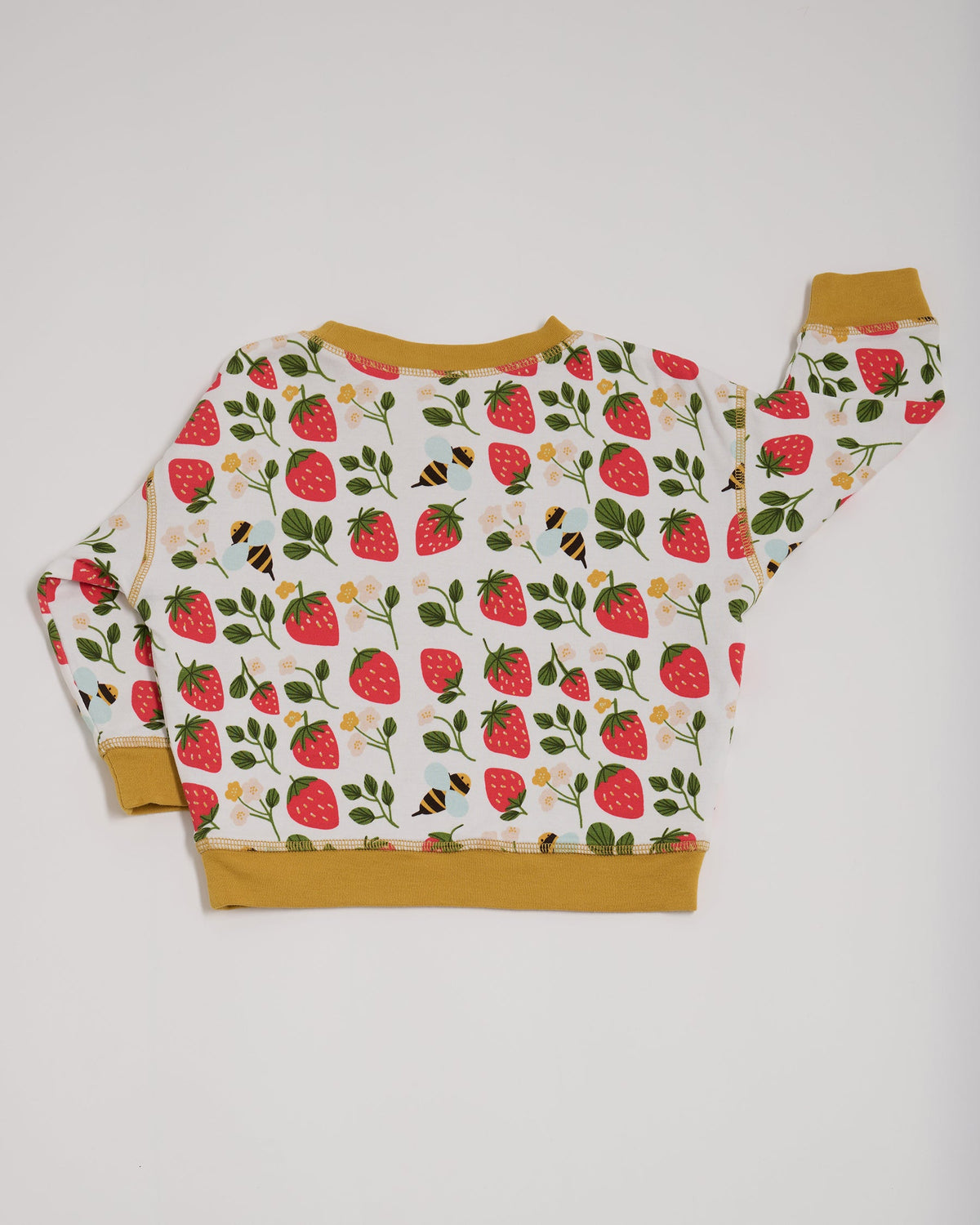 Back of sweatshirt featuring an all over strawberry and bees print with contrast honey neck and sleeve trim.