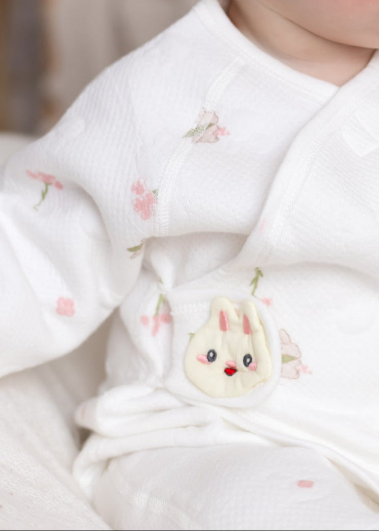 The Snuggle Bun Boucle Wrap Baby Grow Romper