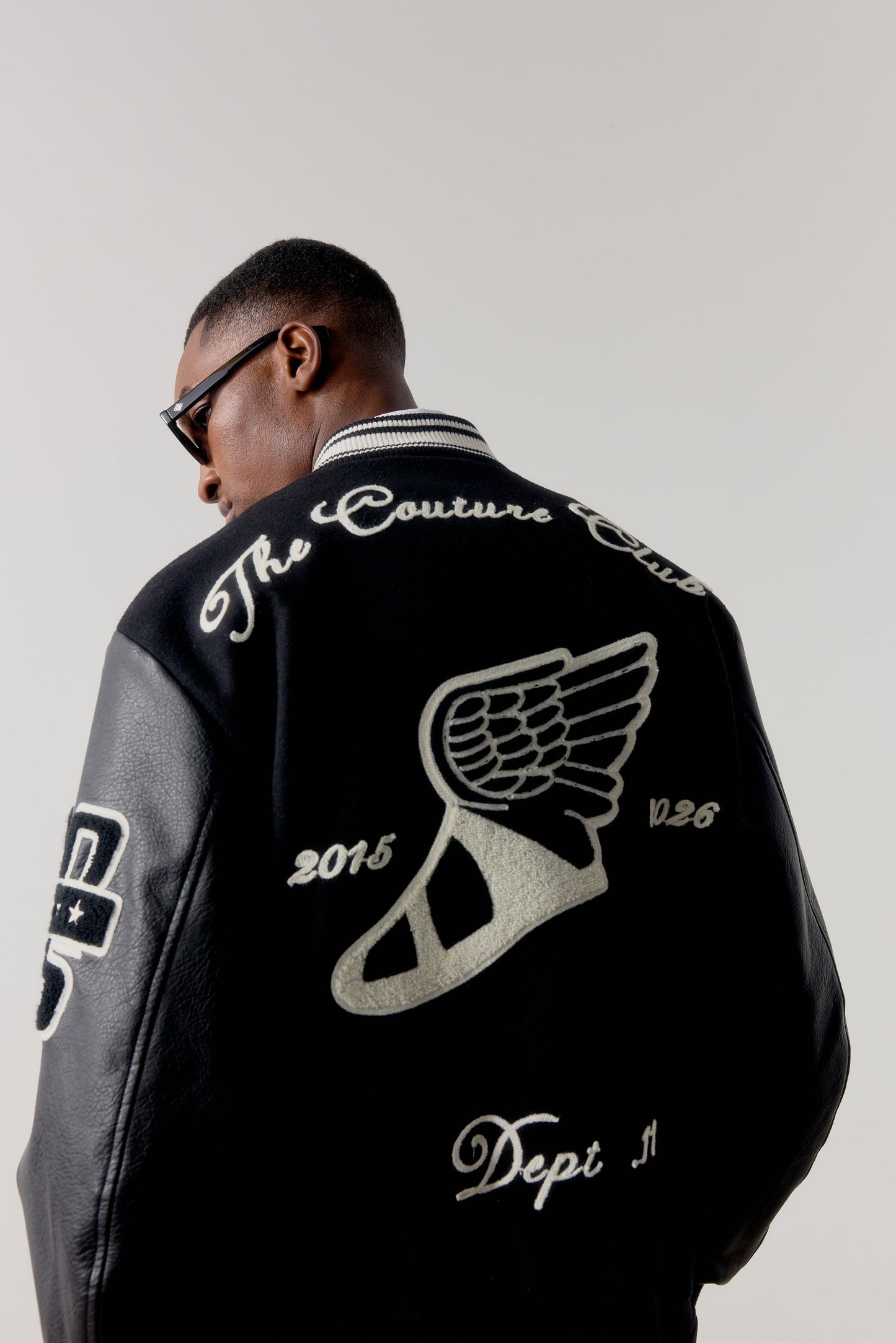 MULTI BADGE VARSITY JACKET - BLACK