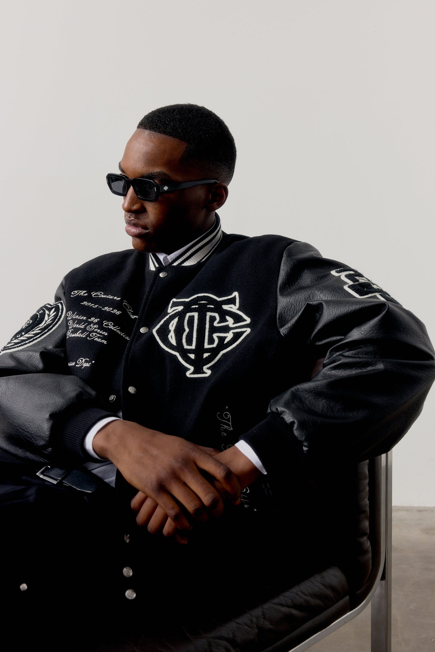 MULTI BADGE VARSITY JACKET - BLACK