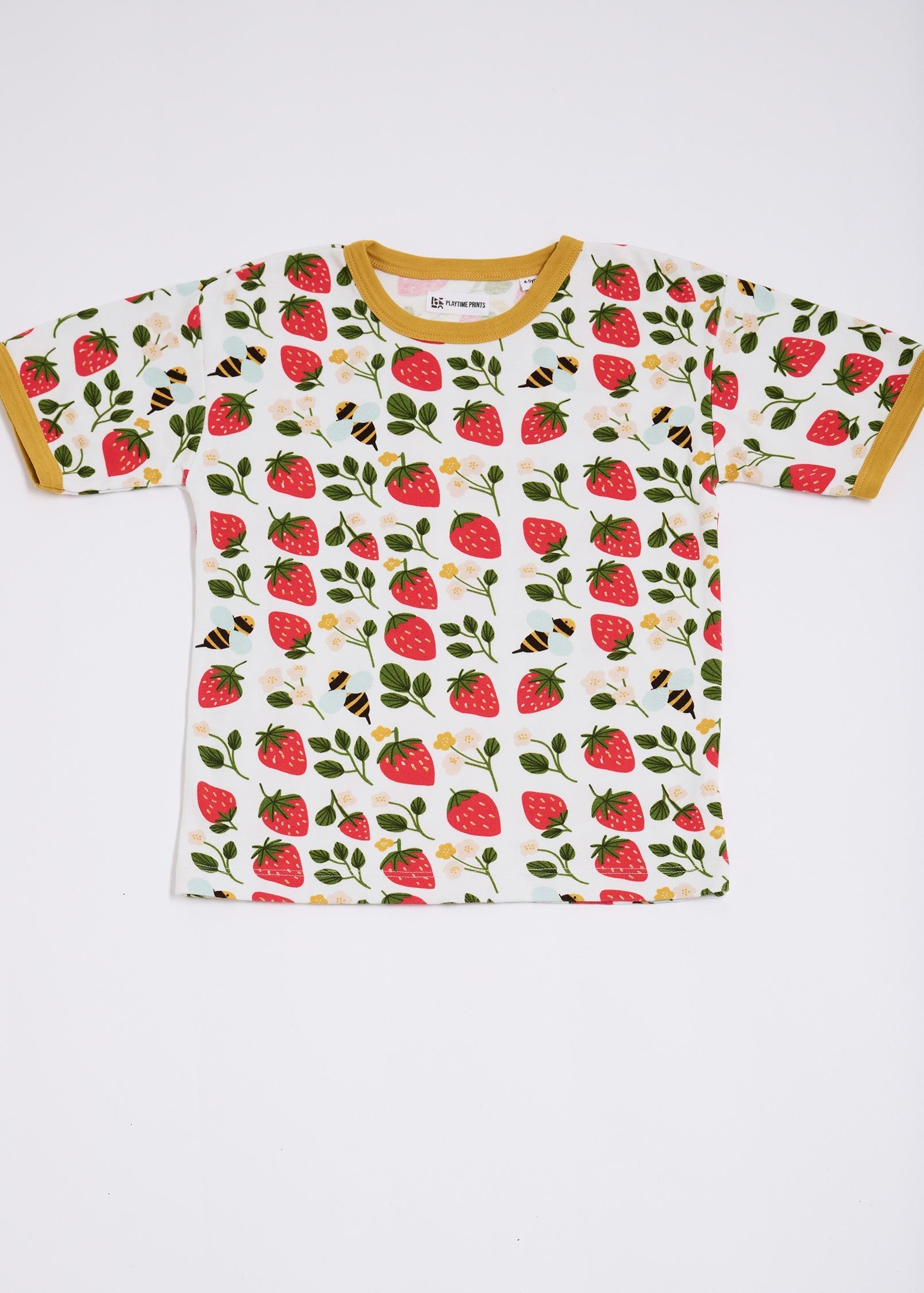 Front of short sleeved t-shirt featuring an all over strawberry and bees print with contrast honey neck and sleeve trim.