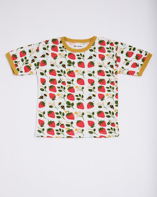 Front of short sleeved t-shirt featuring an all over strawberry and bees print with contrast honey neck and sleeve trim.