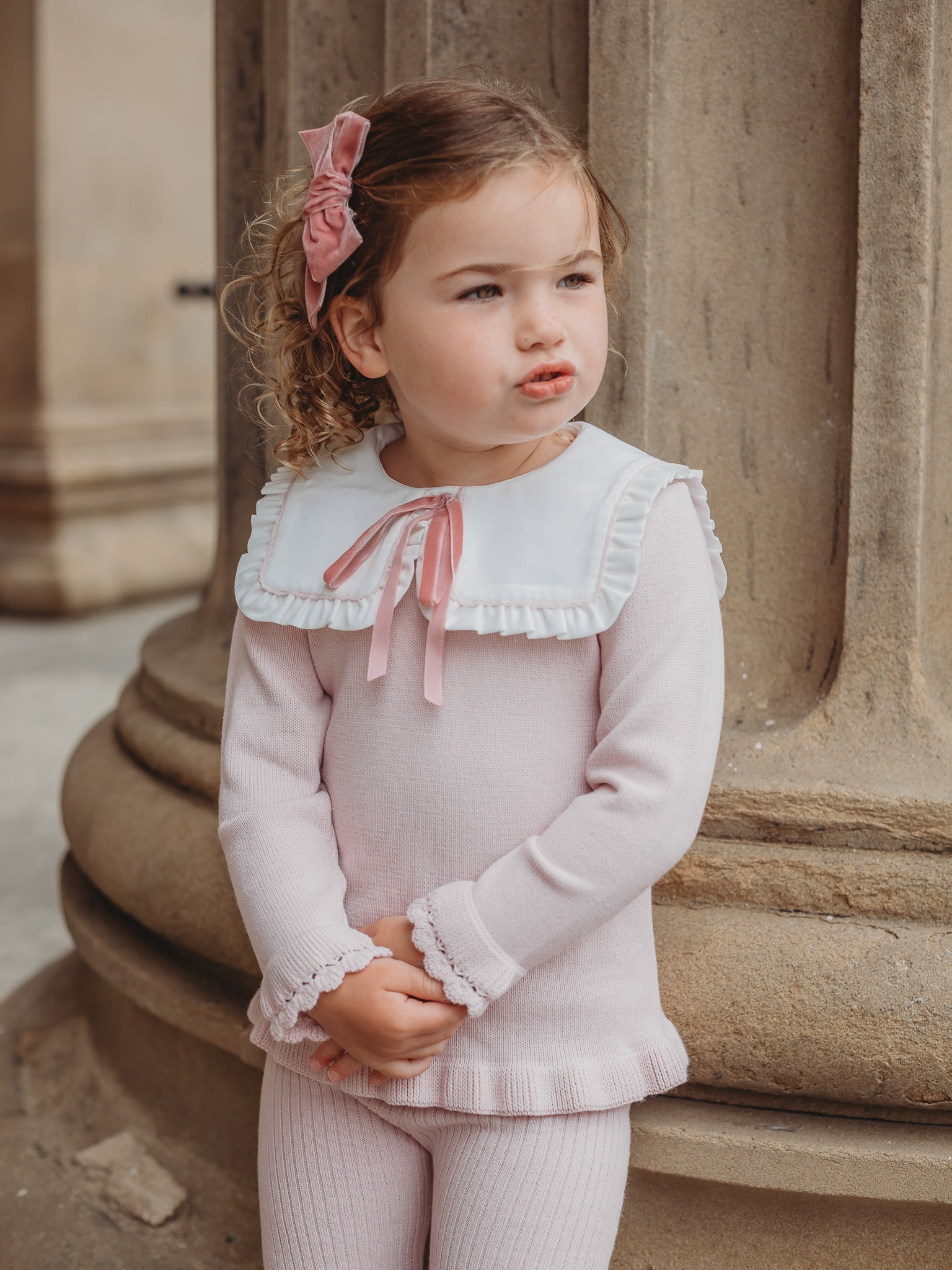 'Etta' pink knitted suit with bib collar - Rose & Albert
