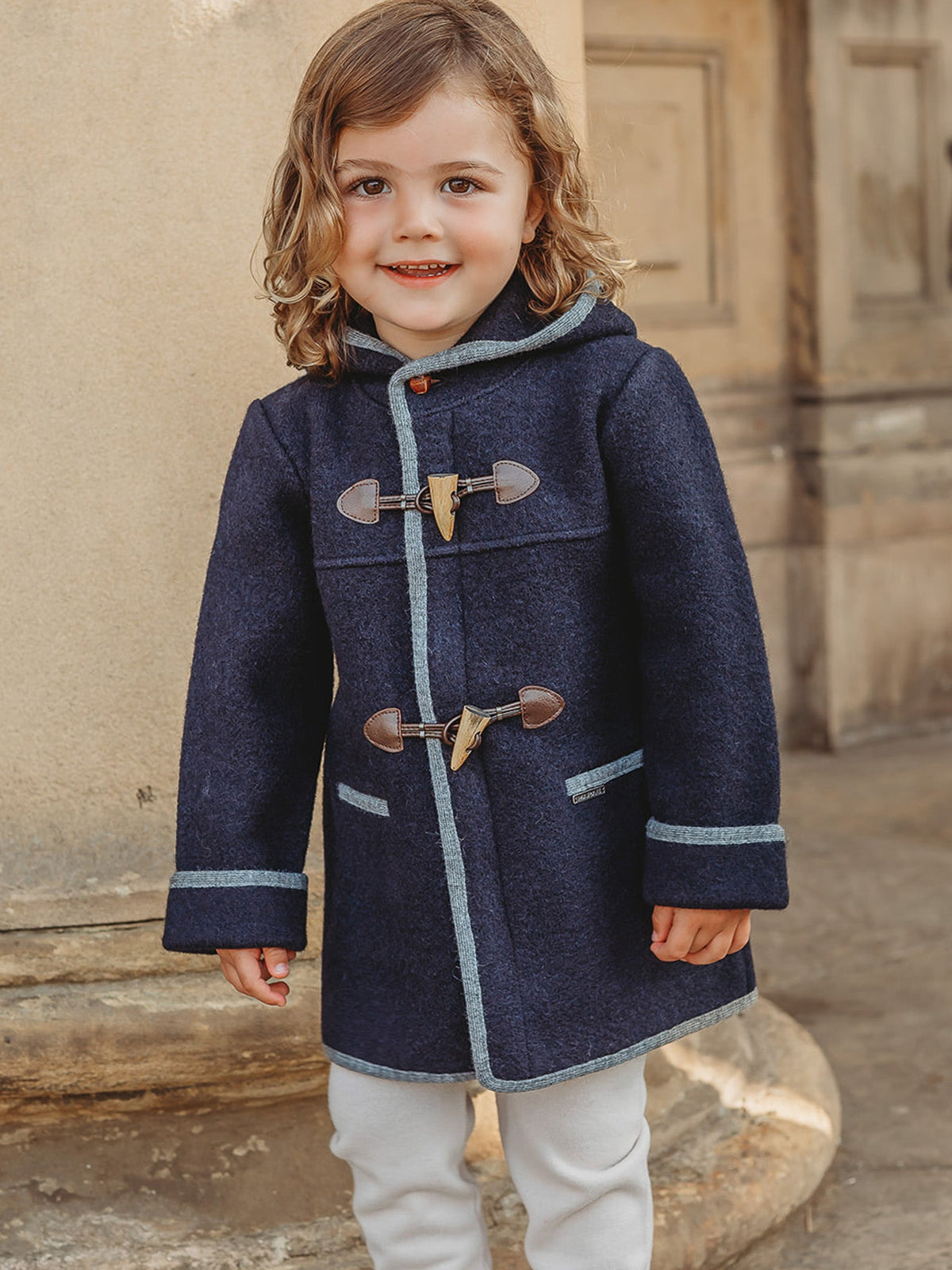 Marae Navy hooded merino wool duffle coat - Rose & Albert