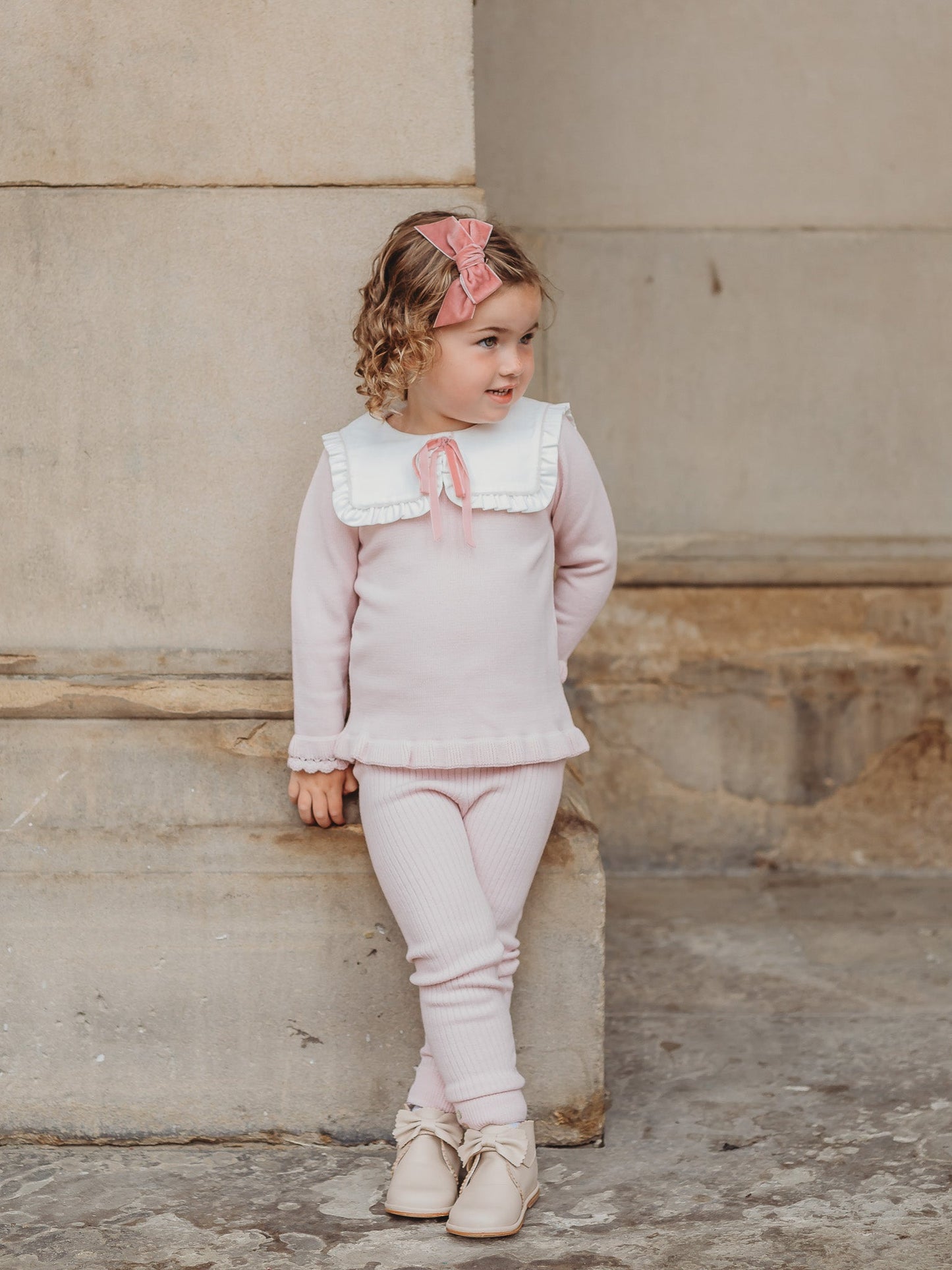 'Etta' pink knitted suit with bib collar - Rose & Albert
