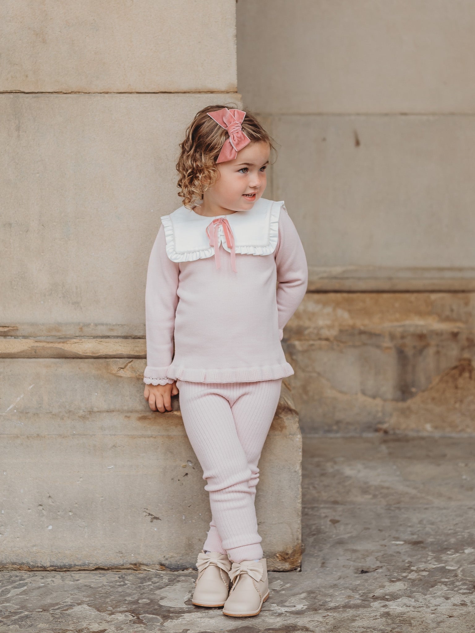 'Etta' pink knitted suit with bib collar - Rose & Albert