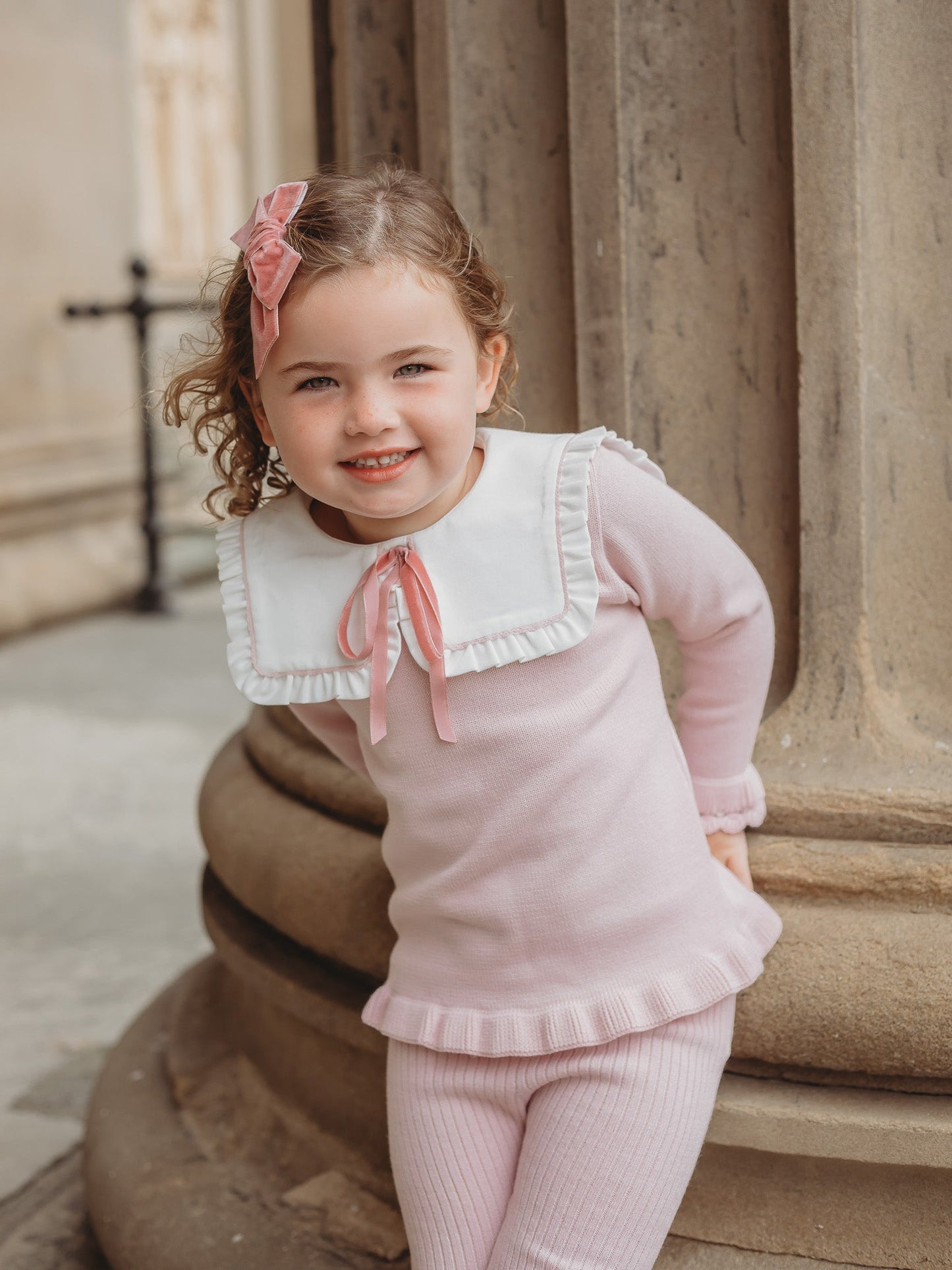 'Etta' pink knitted suit with bib collar - Rose & Albert