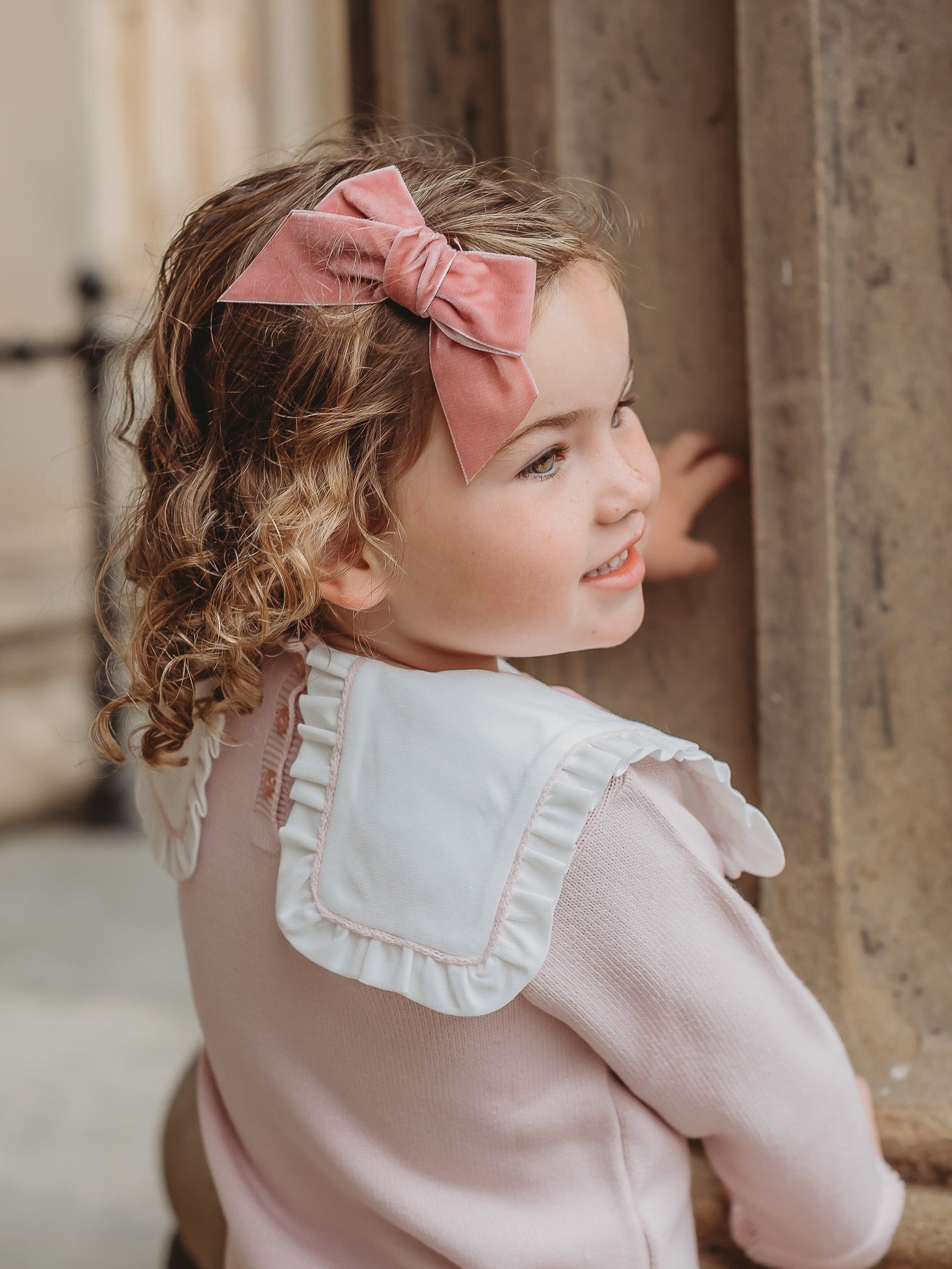 'Etta' pink knitted suit with bib collar - Rose & Albert