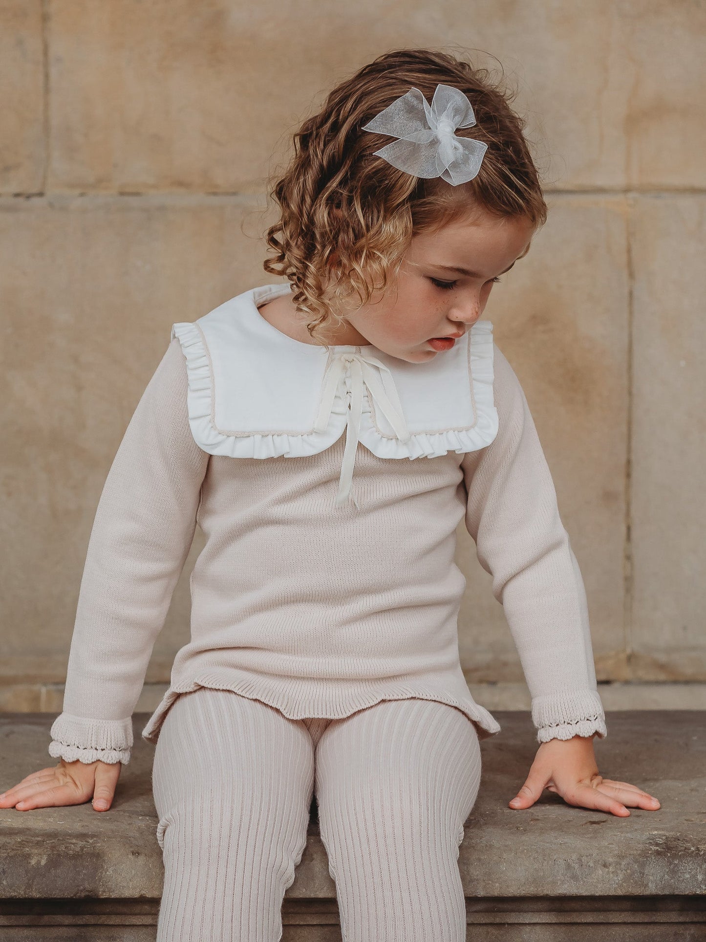 'Mabel' beige knitted suit with bib collar - Rose & Albert
