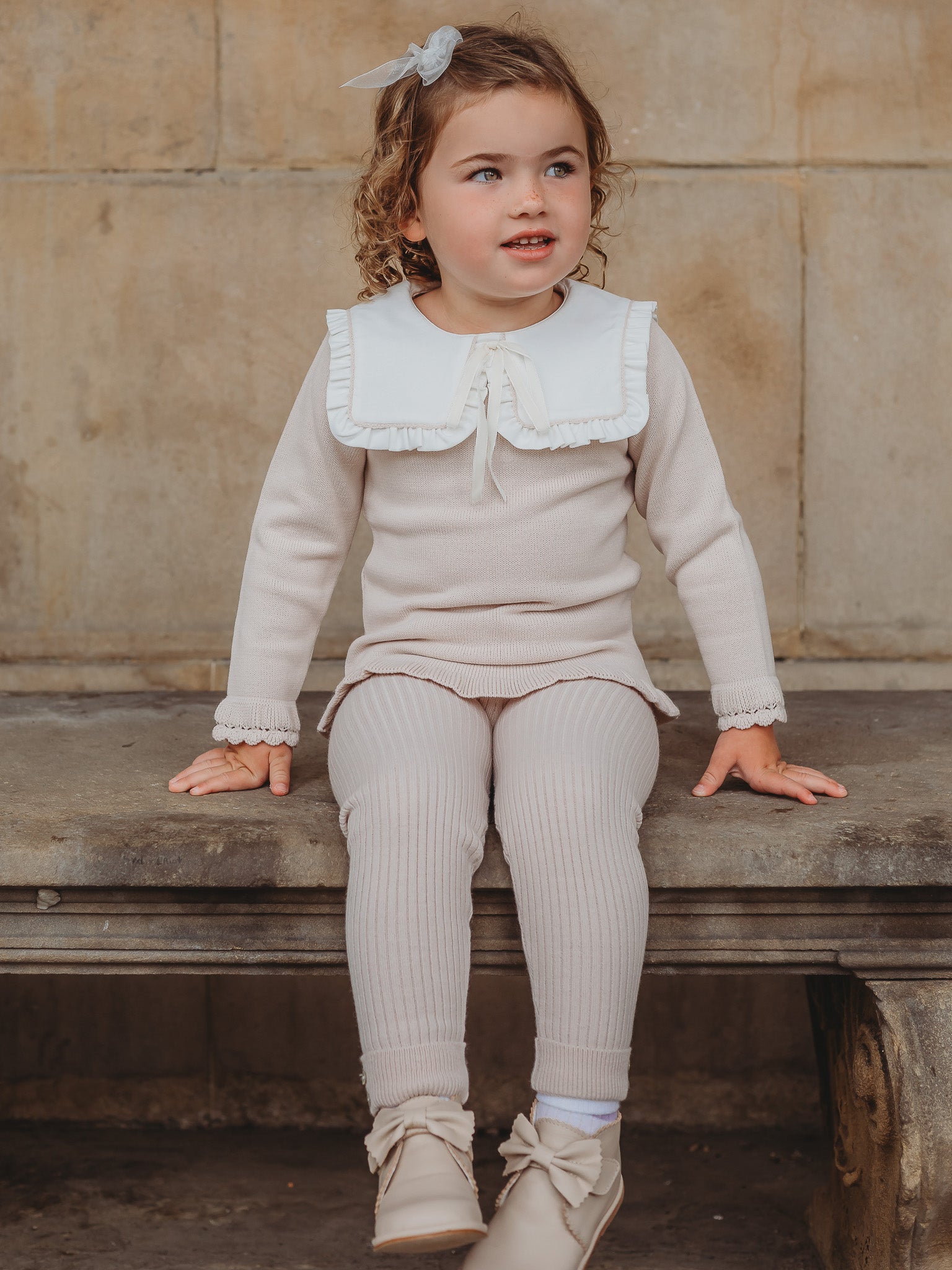 'Mabel' beige knitted suit with bib collar - Rose & Albert