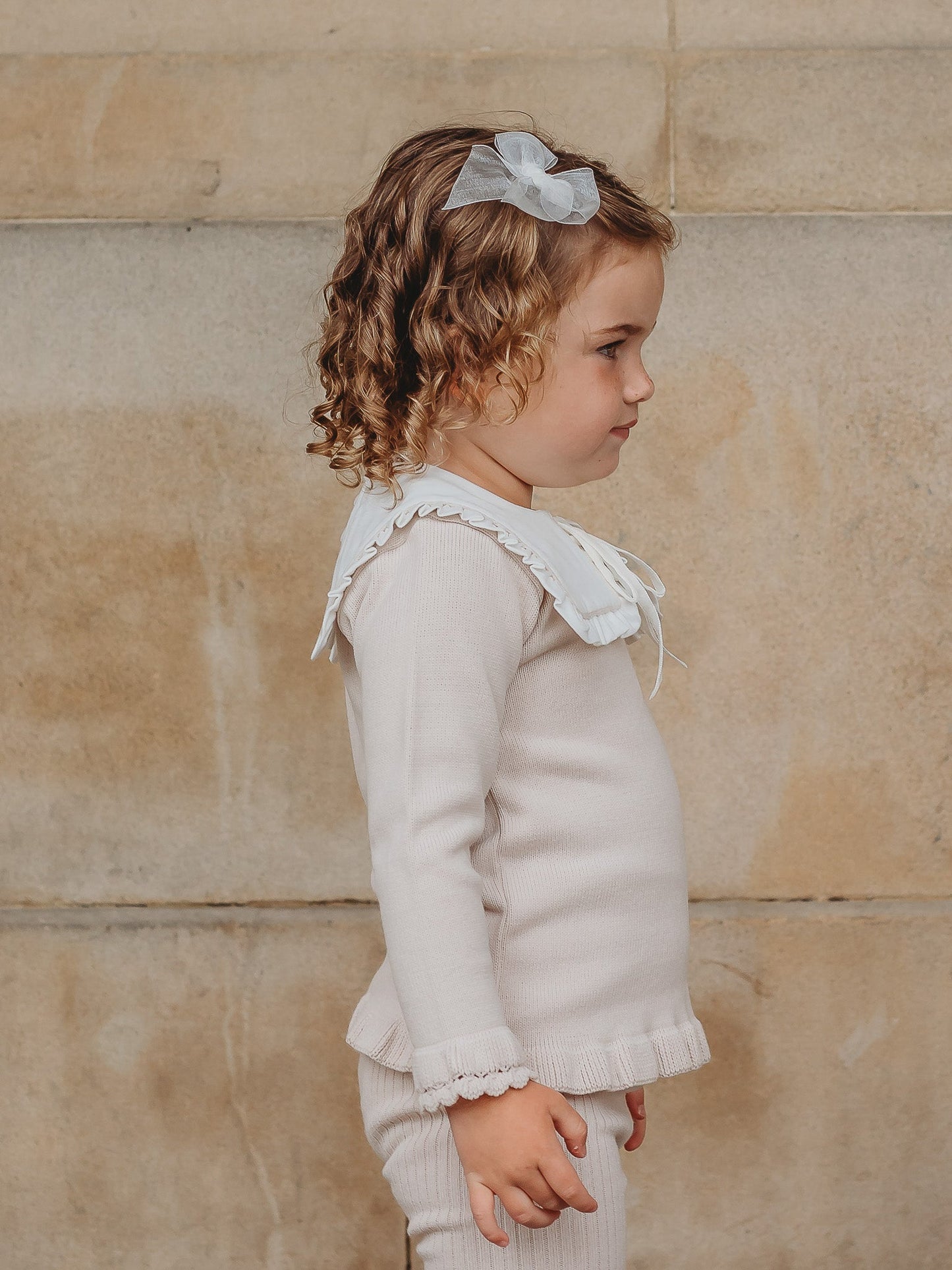 'Mabel' beige knitted suit with bib collar - Rose & Albert