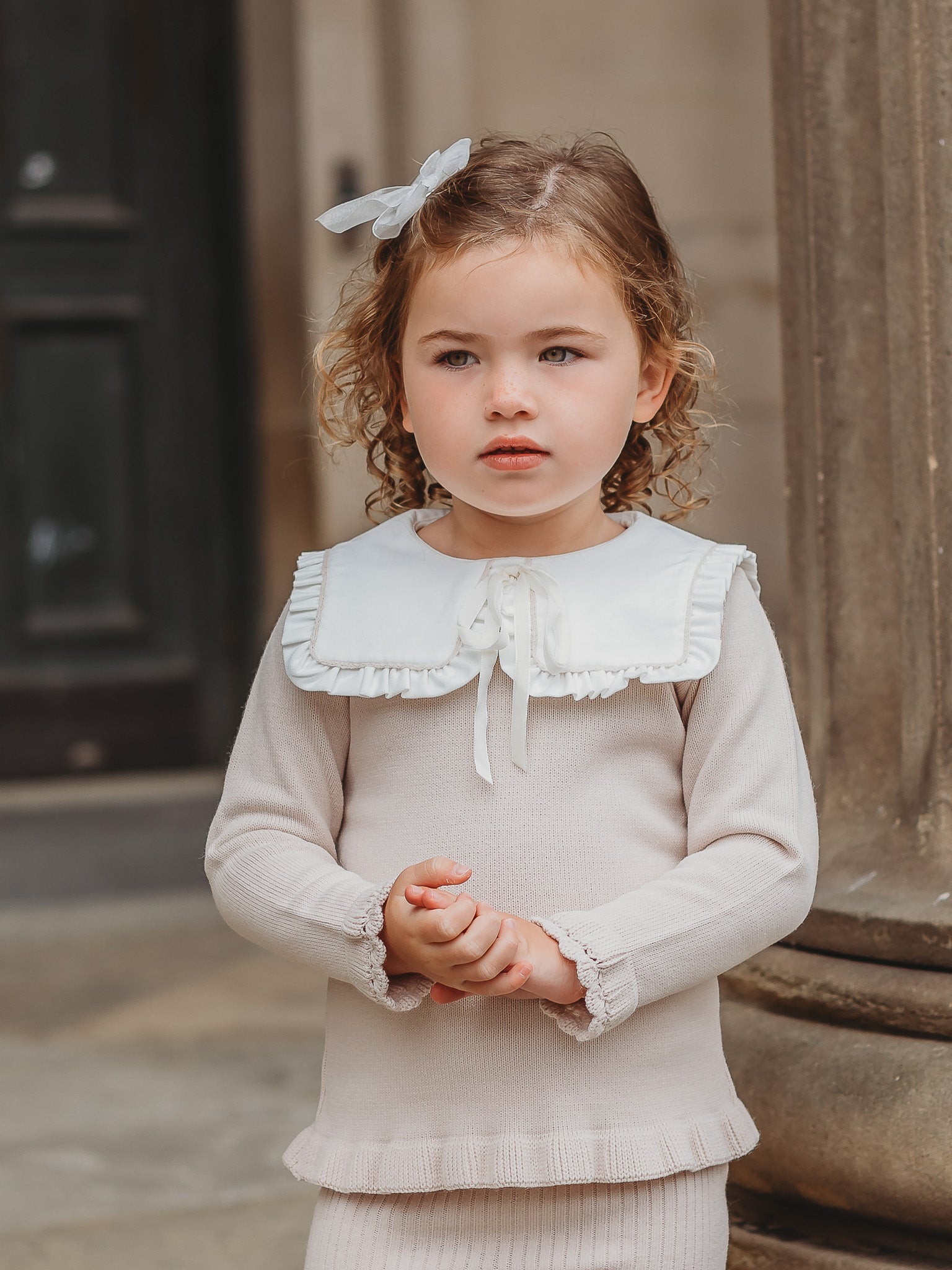 'Mabel' beige knitted suit with bib collar - Rose & Albert