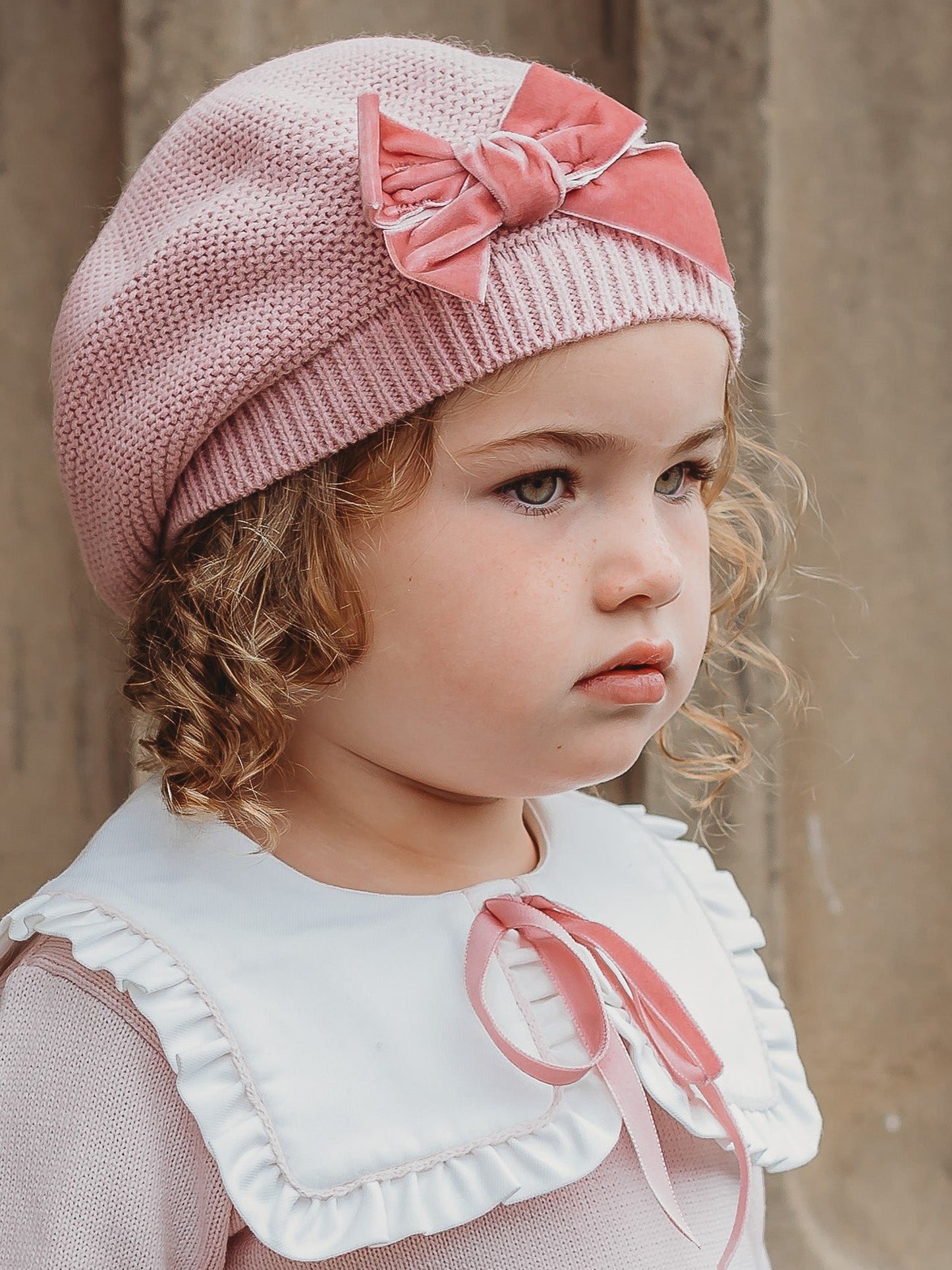 'Etta' pink knitted suit with bib collar - Rose & Albert