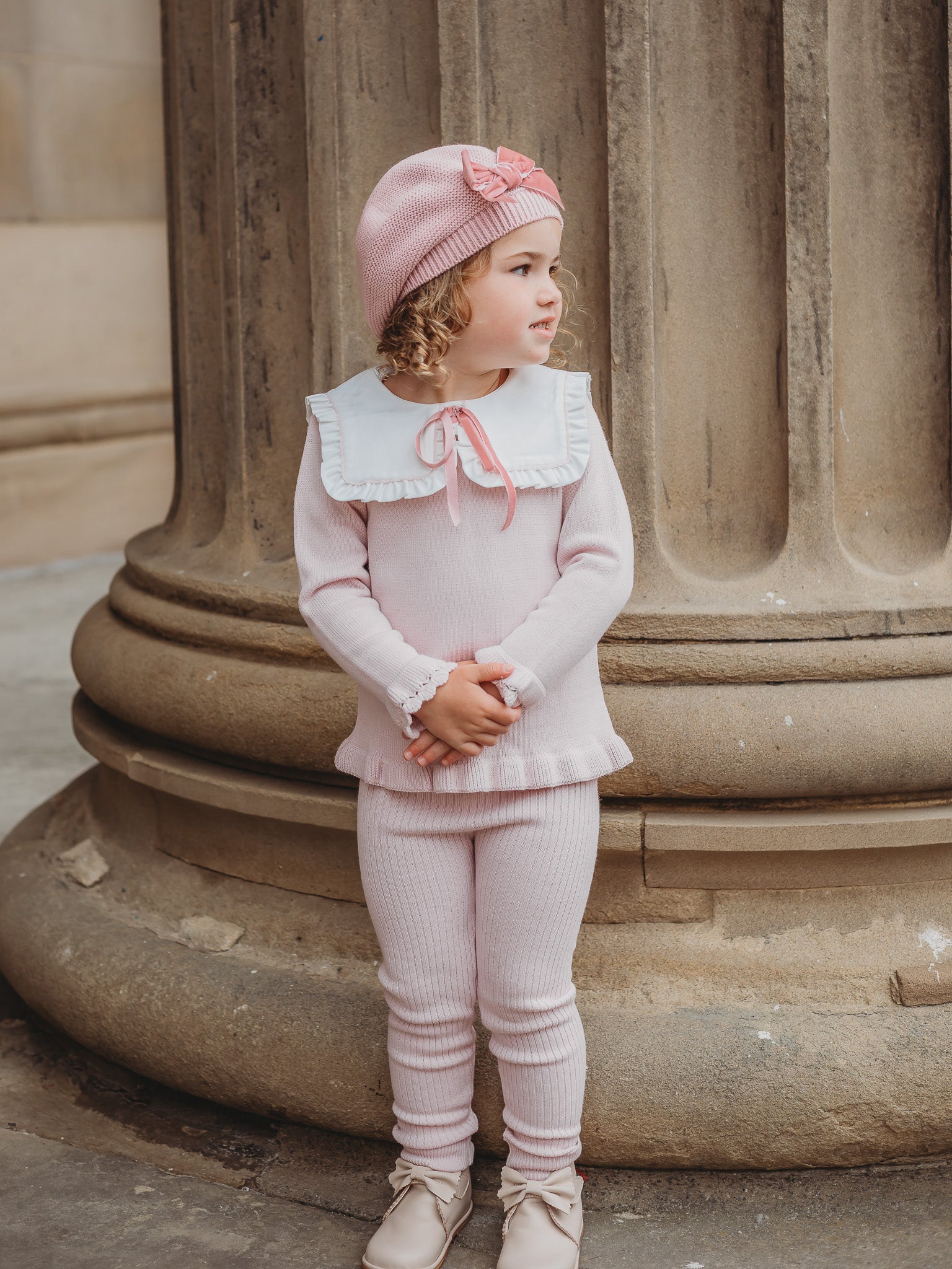 'Etta' pink knitted suit with bib collar - Rose & Albert