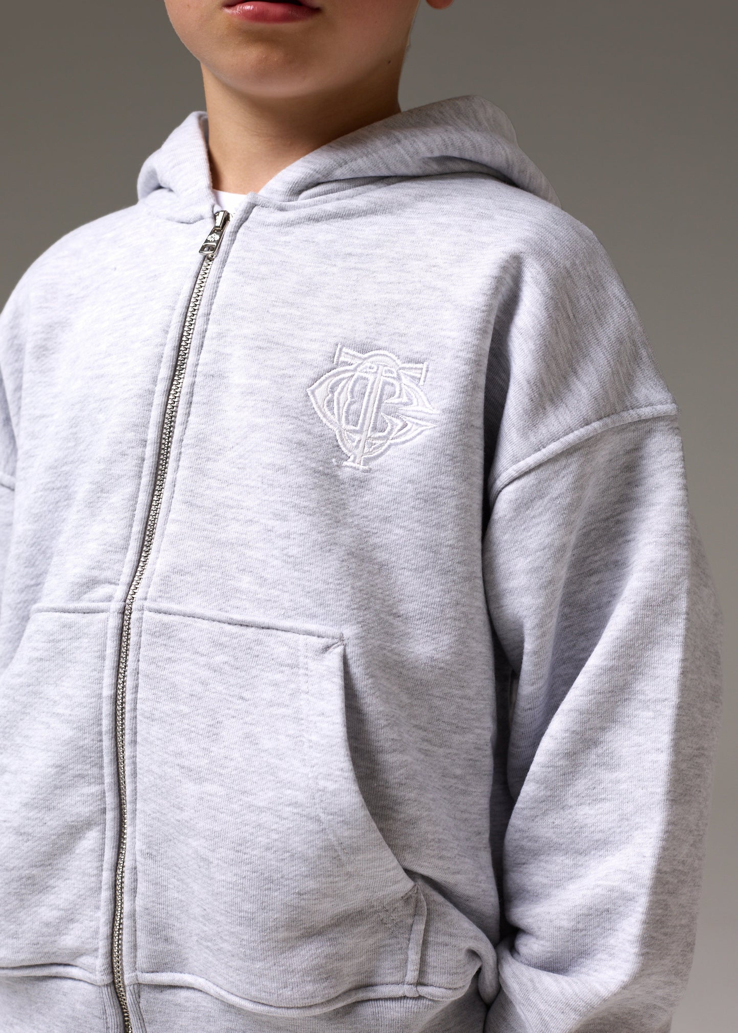 Junior Zip Through Emblem Applique Hoodie Marl in Grey