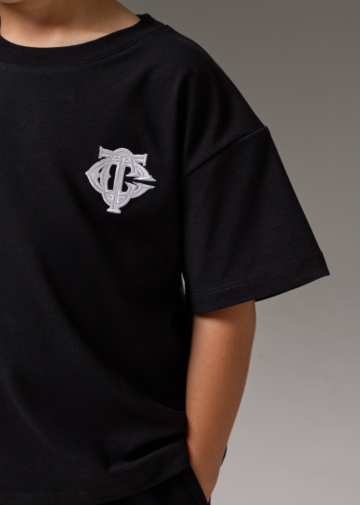 Junior Monogram Emblem Applique T Shirt in Black