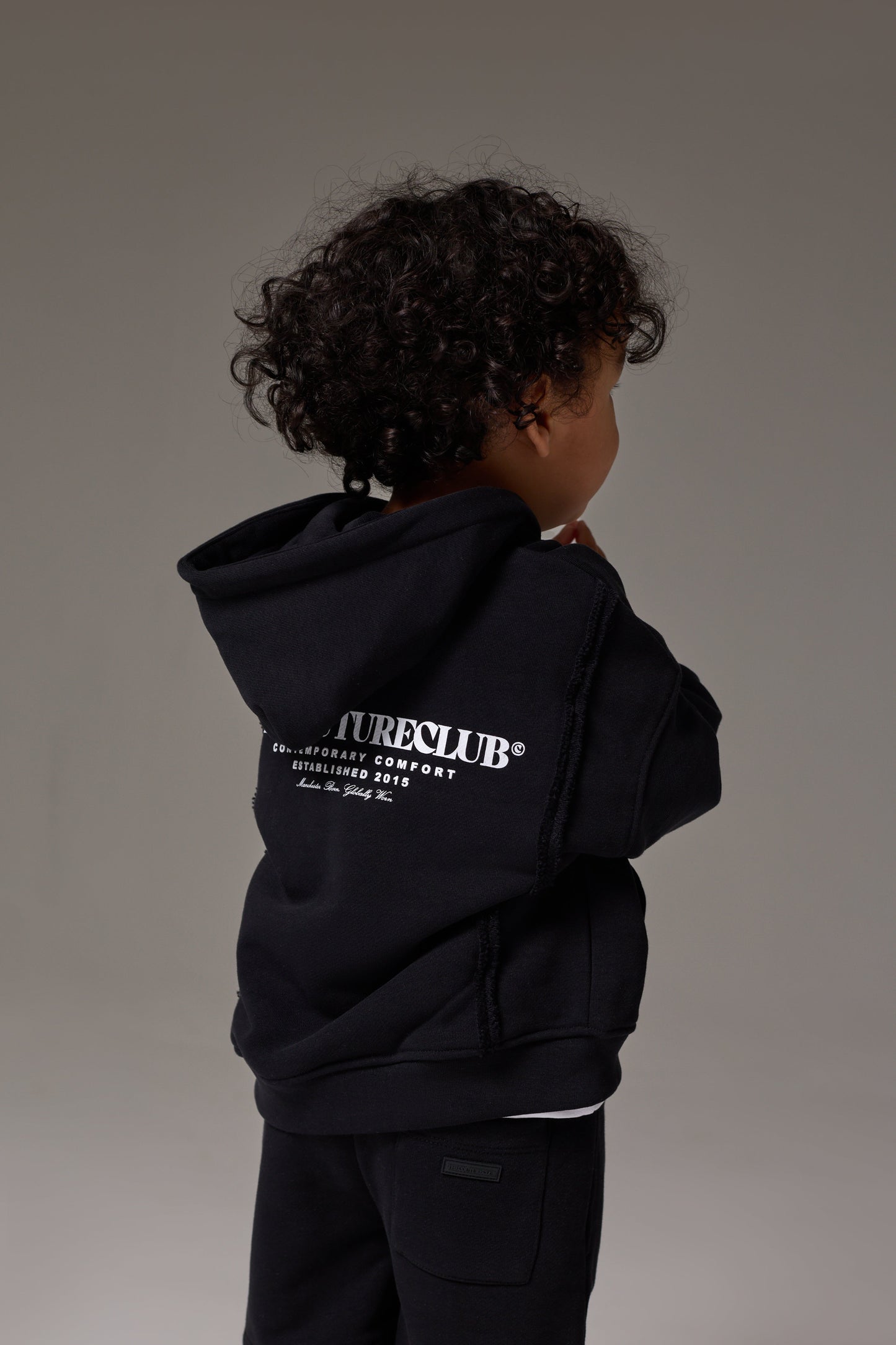 KIDS COPYRIGHT ZIP THROUGH HOODIE - BLACK
