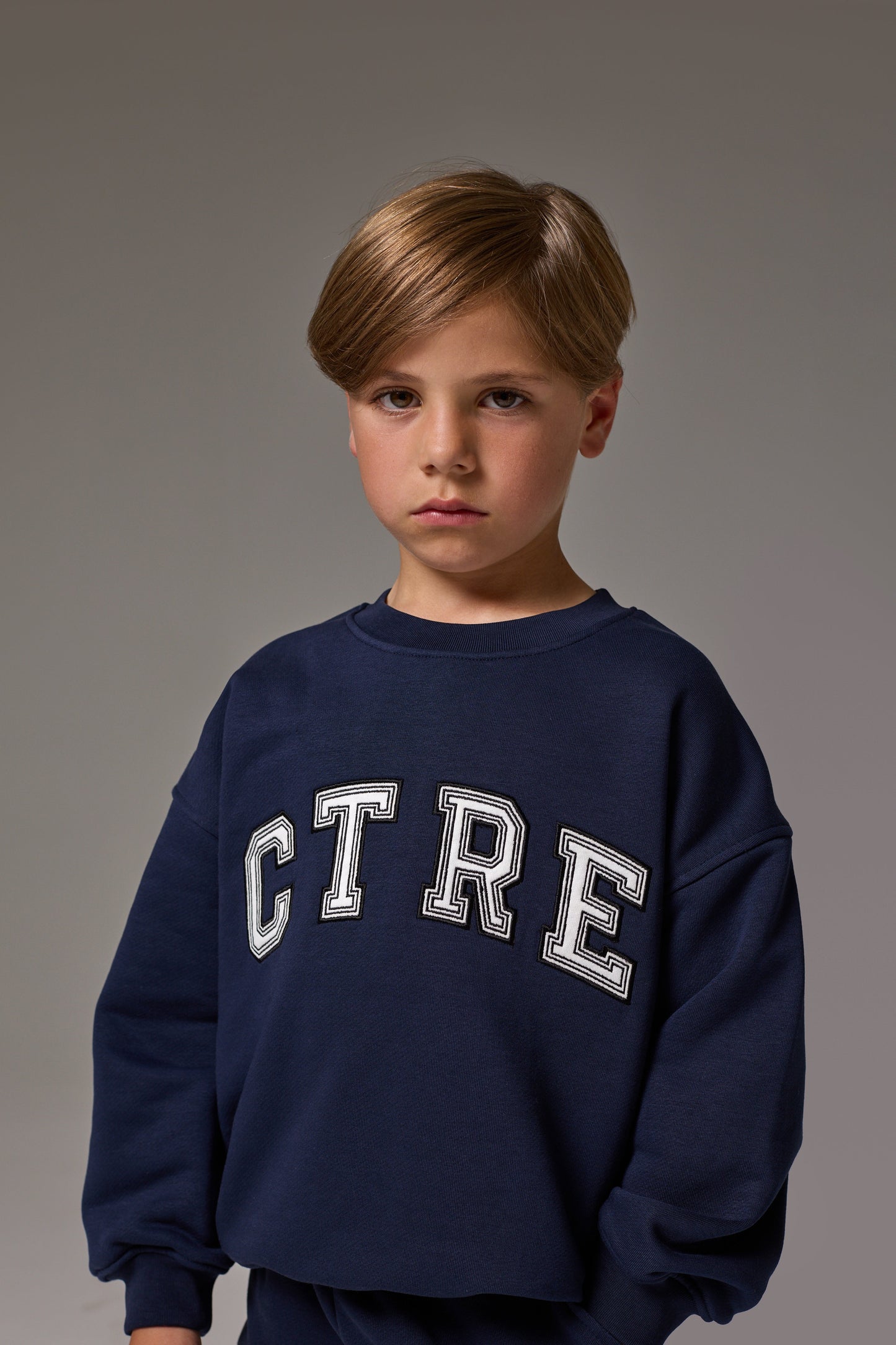 JUNIOR CTRE SWEATSHIRT - NAVY