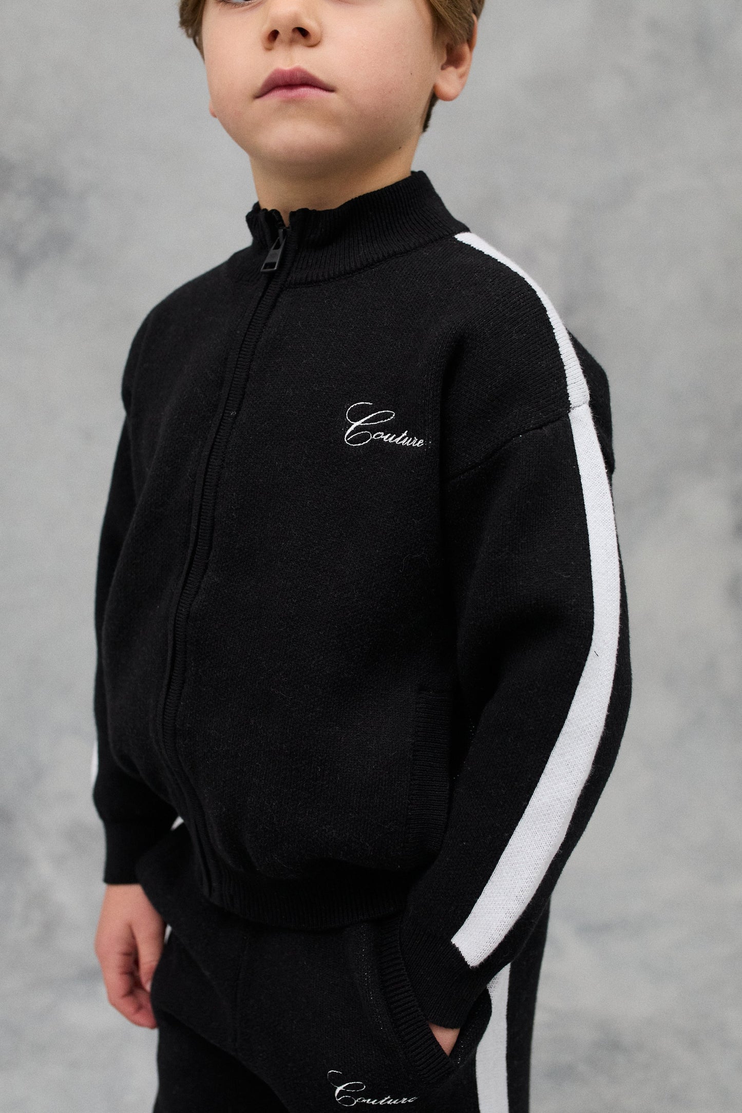 JNR SIDE STRIPE KNITTED ZIP THROUGH - BLACK