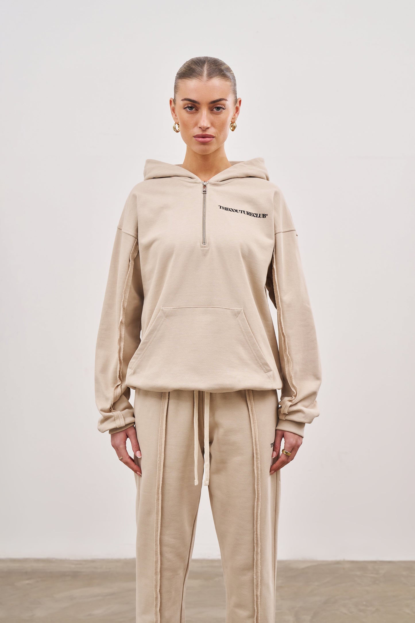 RAW SEAM QUARTER ZIP HOODIE - BEIGE