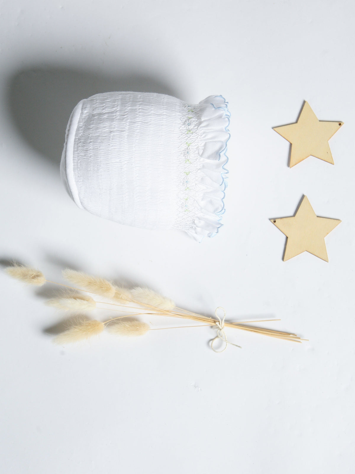 Sarah Louise Rosebud white & blue rosebud smocked bonnet - Rose & Albert