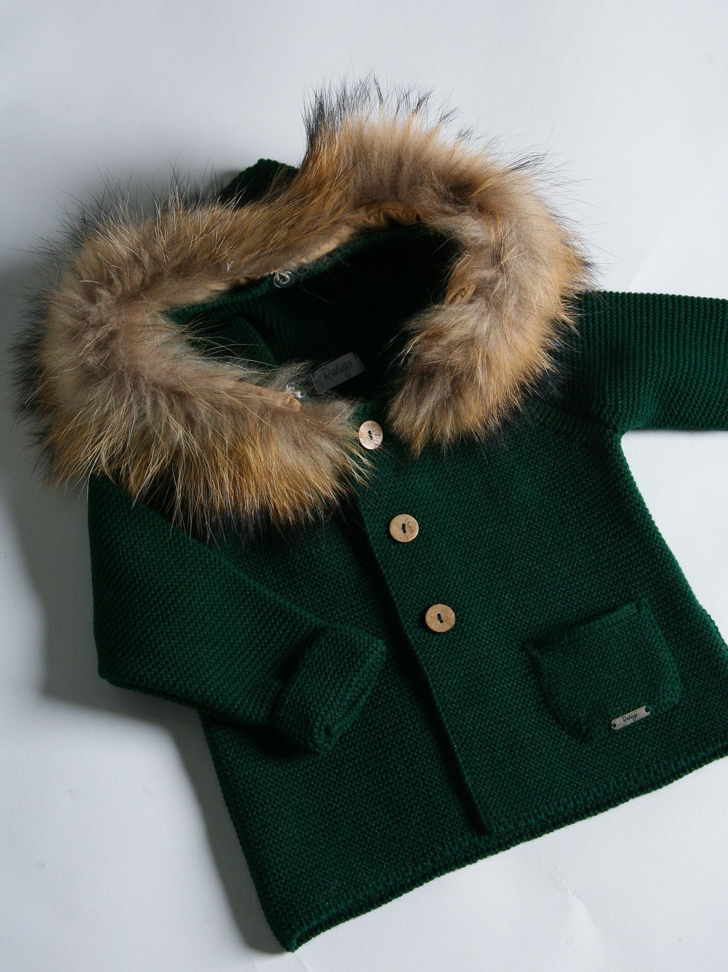 Rahigo bottle green knitted cardigan with fur hood - Rose & Albert