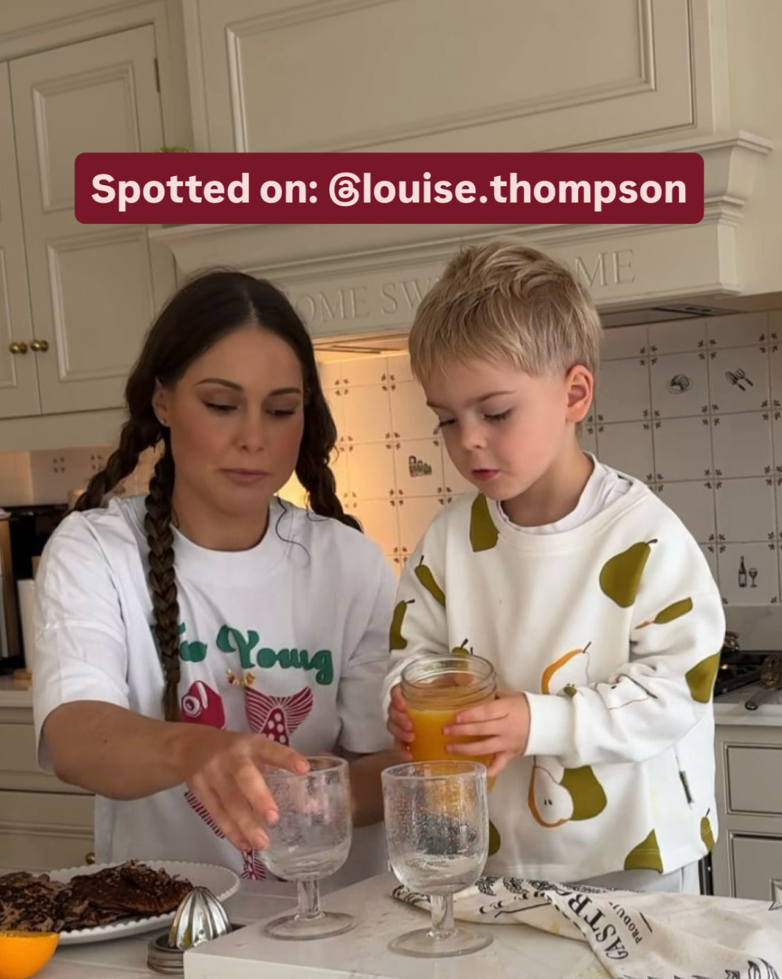 Louise Thompson’s son wearing the Wildgreen pear sweater from the Orchard Collection – a unisex, organic cotton kids sweater inspired by nature and designed for comfort, durability, and timeless style.