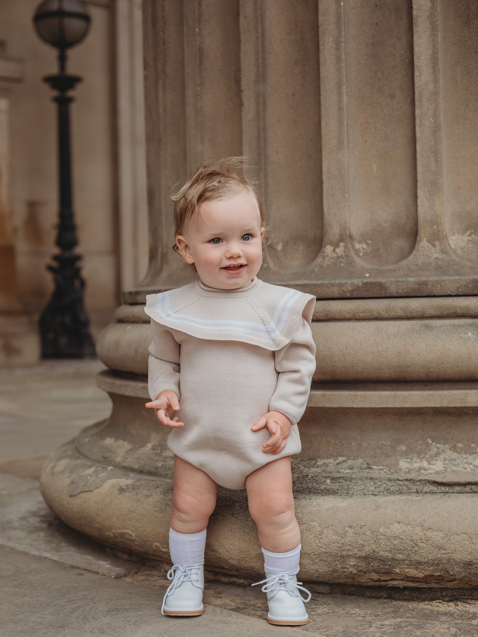 'Finn' beige & white knitted romper with sailor collar - Rose & Albert
