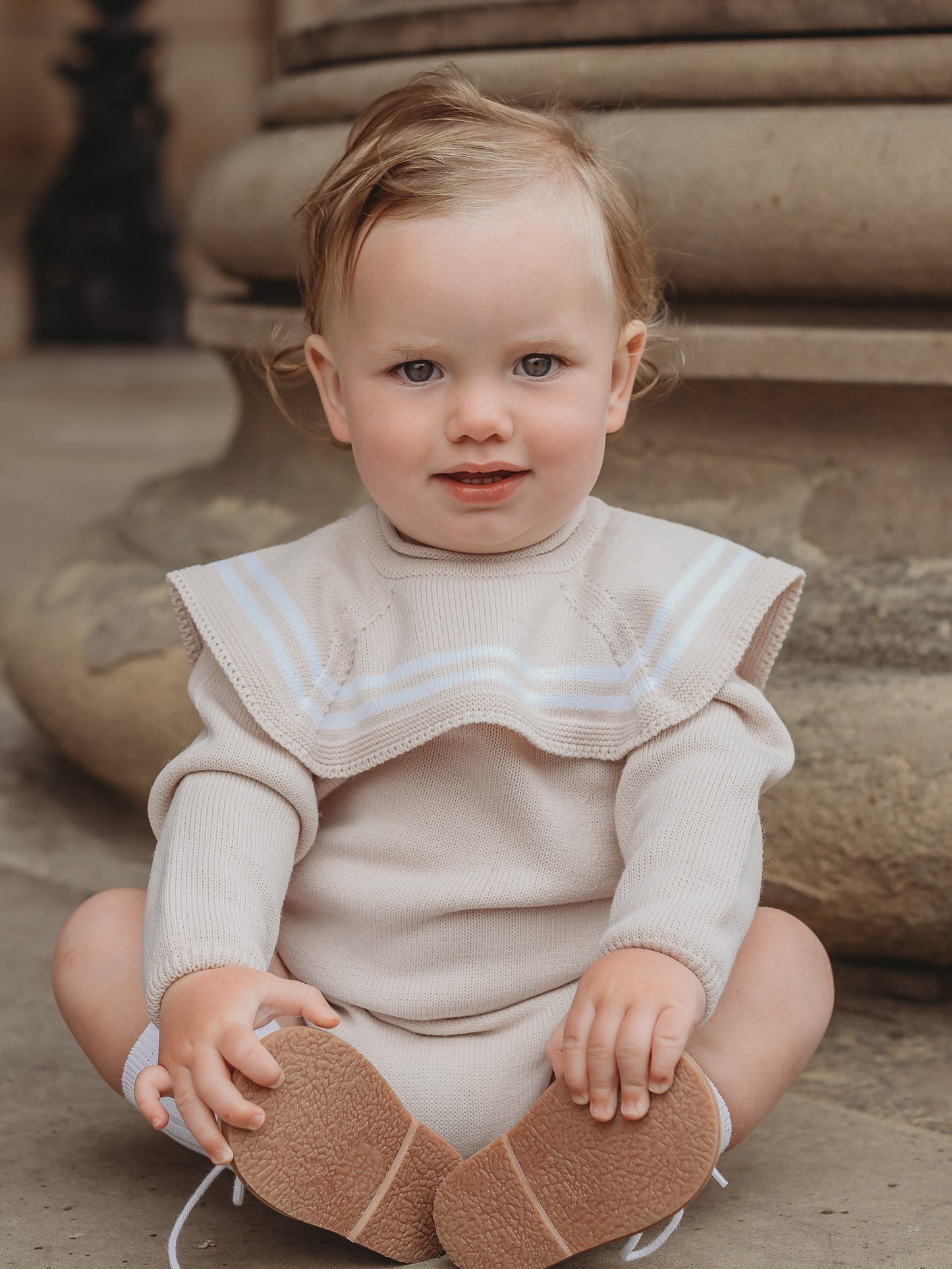 'Finn' beige & white knitted romper with sailor collar - Rose & Albert