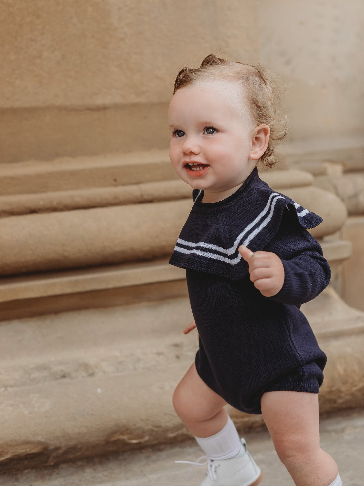 'Arhlo' navy & white knitted romper with sailor collar - Rose & Albert