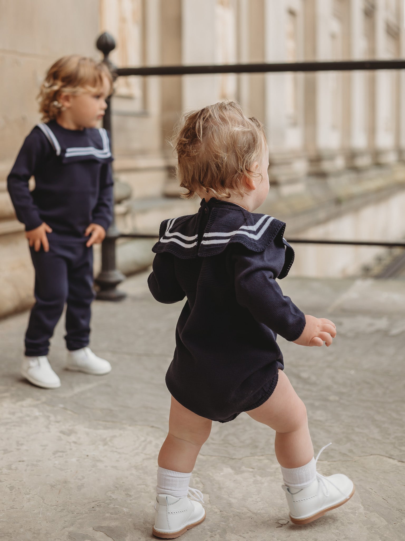 'Arhlo' navy & white knitted romper with sailor collar - Rose & Albert