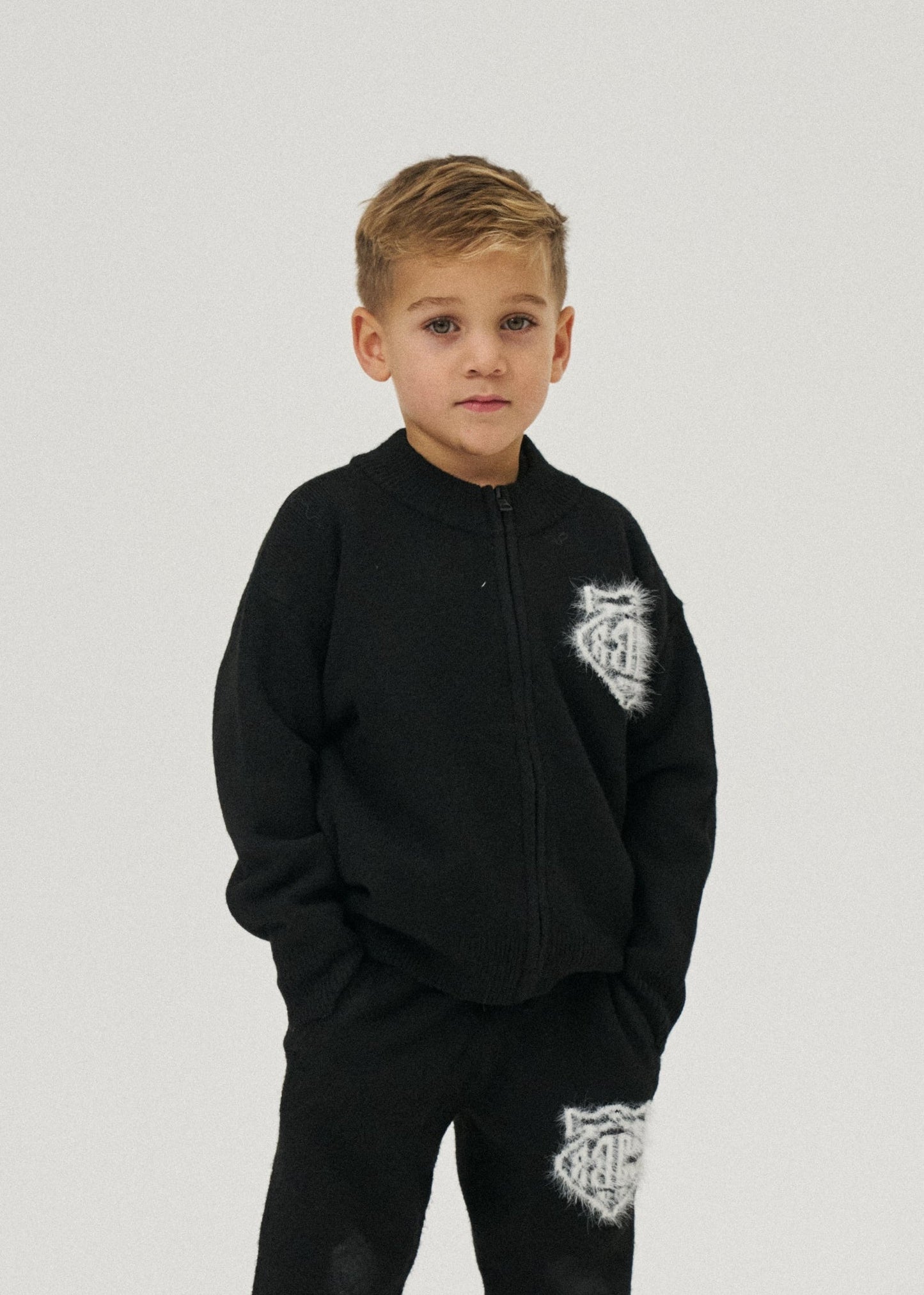 Junior Monogram Fluffy Knit Zip Through in Black