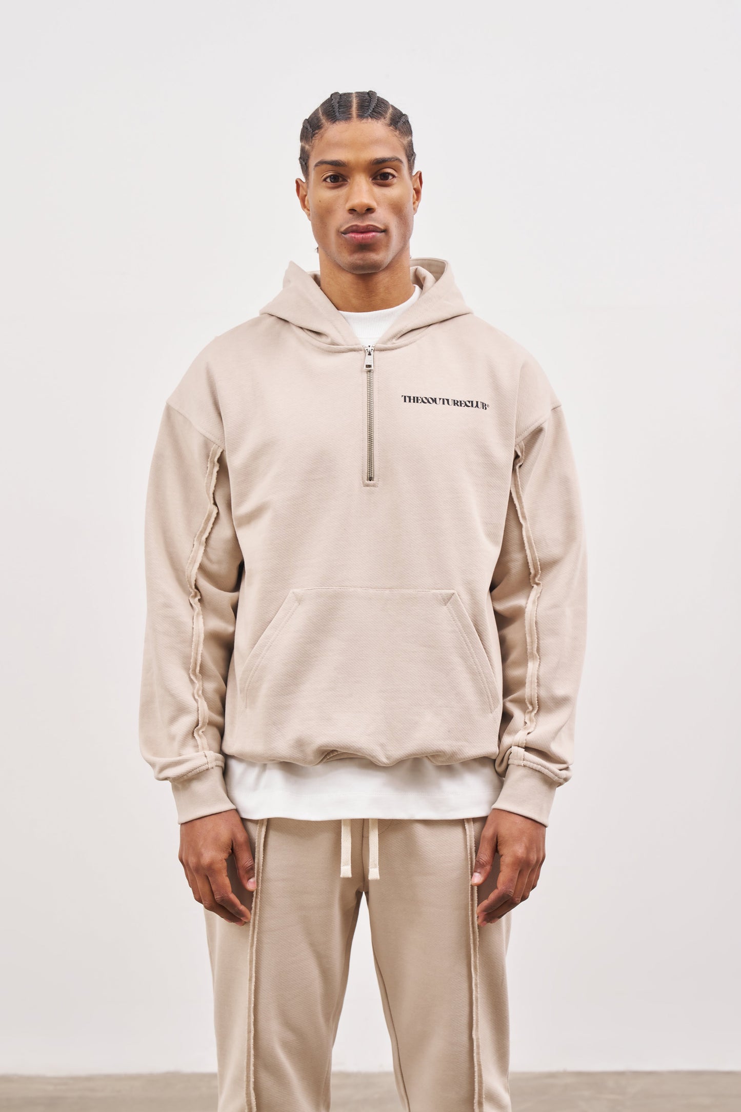RAW SEAM QUARTER ZIP HOODIE - BEIGE