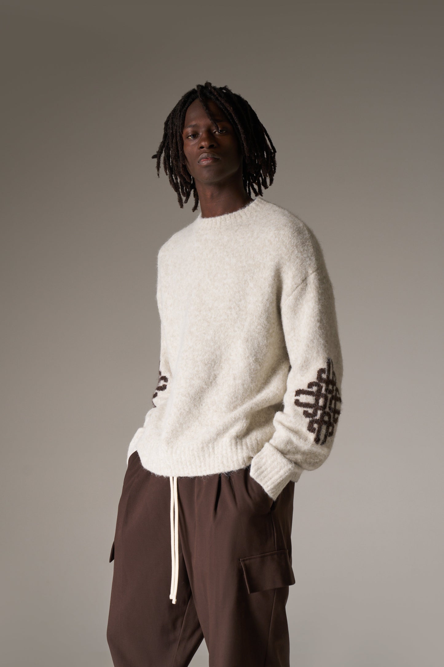 BRUSHED EMBLEM SLEEVE KNITTED CREW - BEIGE
