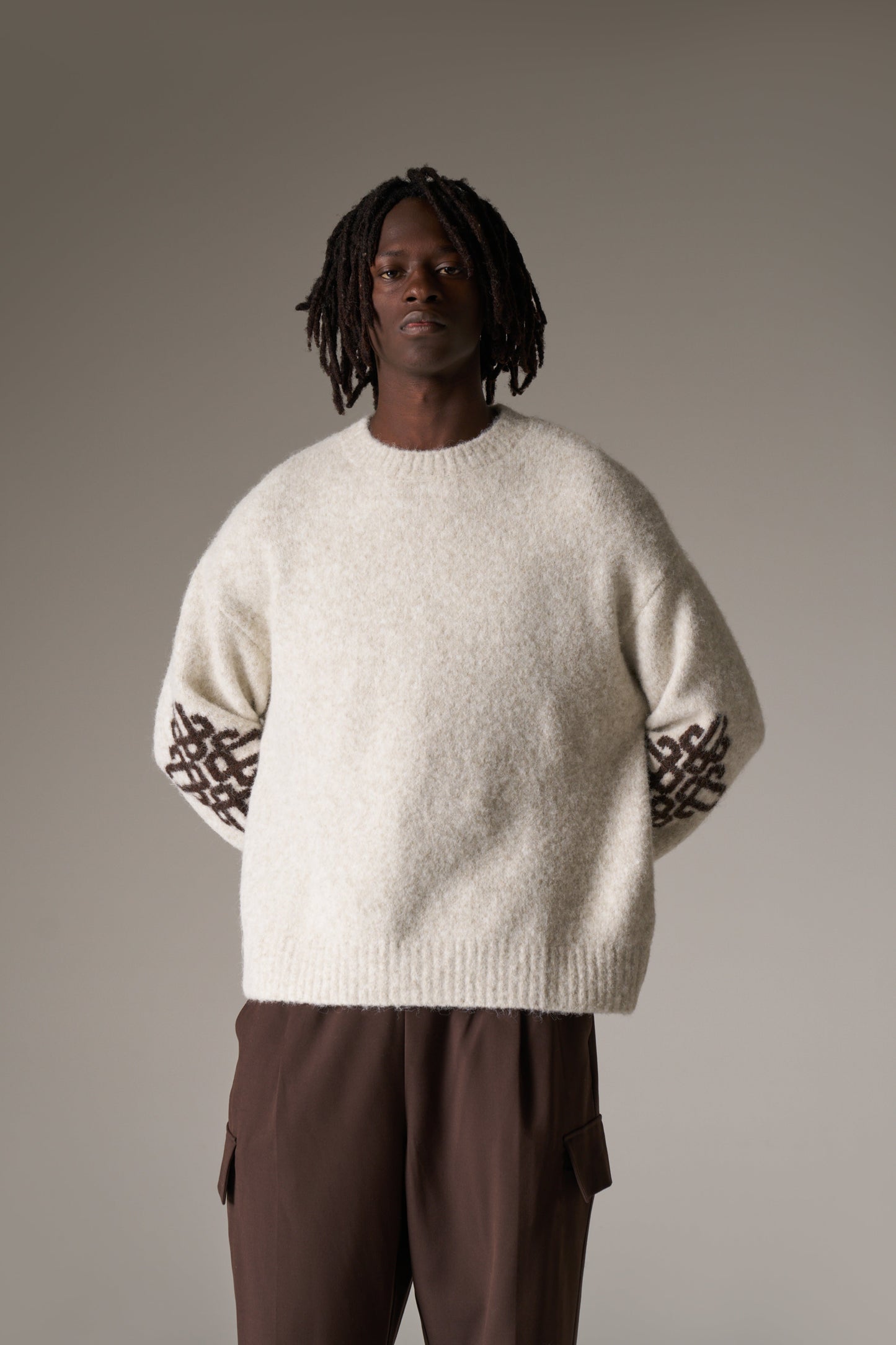 BRUSHED EMBLEM SLEEVE KNITTED CREW - BEIGE