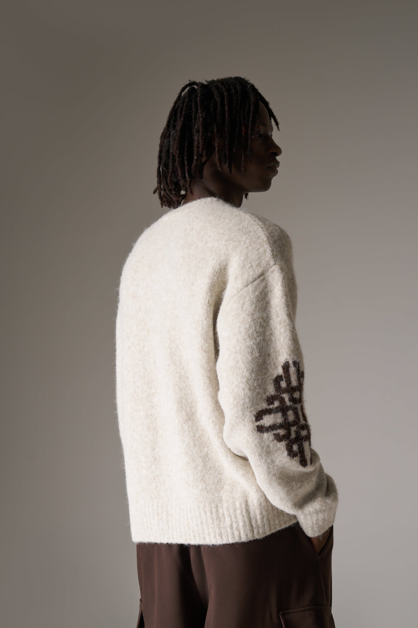 BRUSHED EMBLEM SLEEVE KNITTED CREW - BEIGE