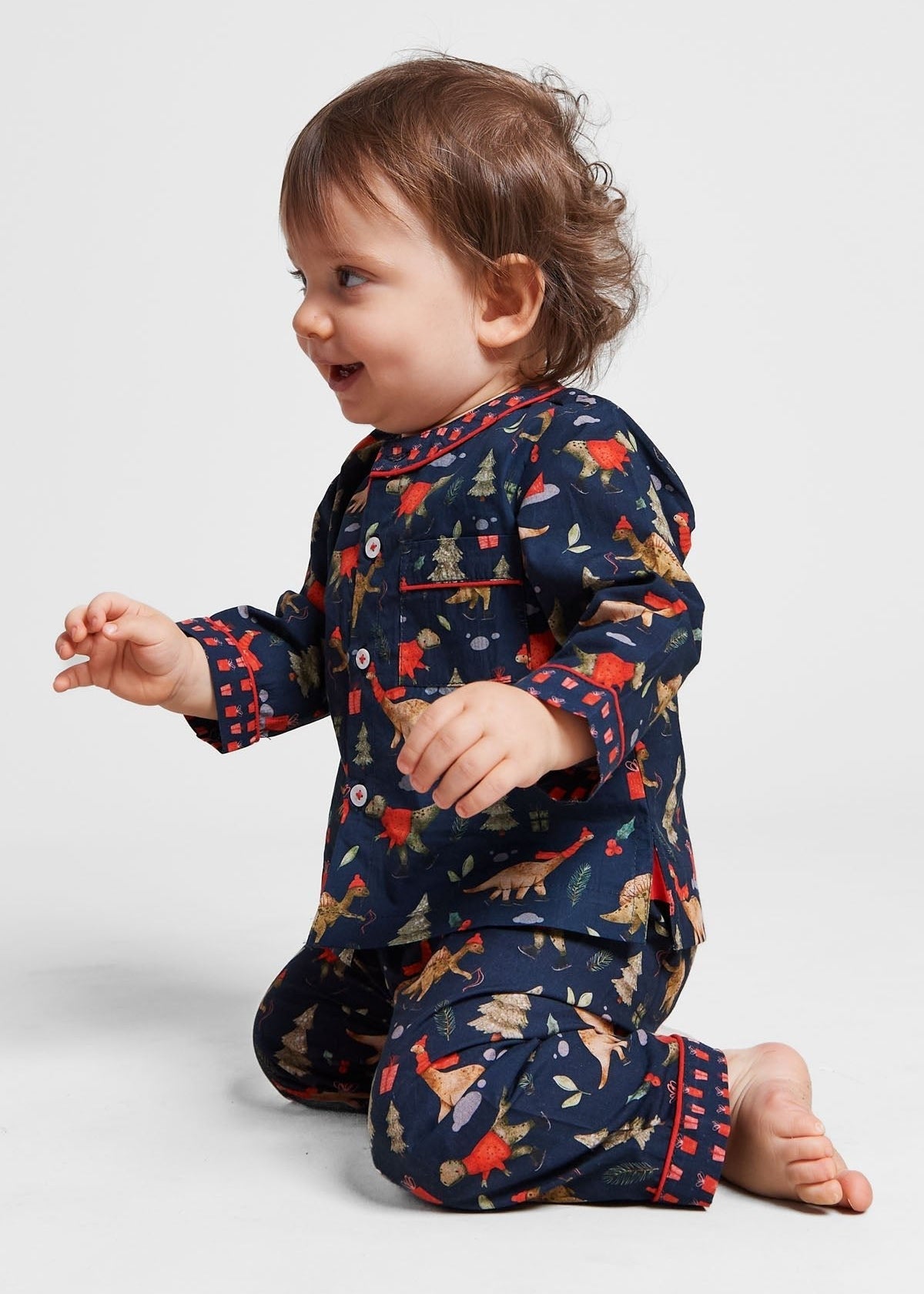 a jurassic christmas - organic cotton baby pyjama set - Kutti Lulu