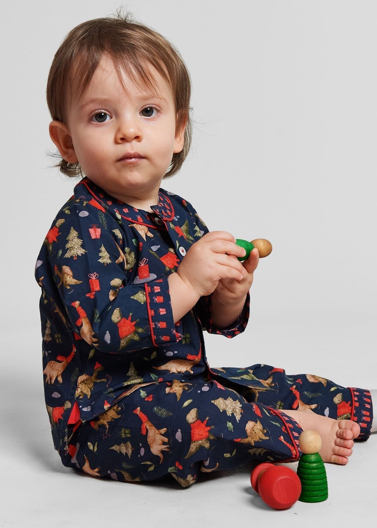 a jurassic christmas - organic cotton baby pyjama set - Kutti Lulu