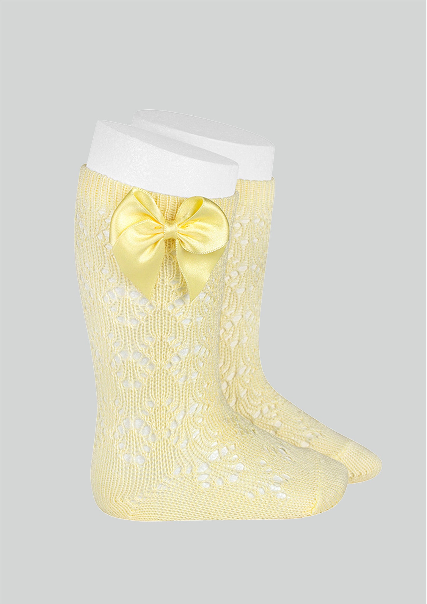 Condor lemon openwork knee socks with satin bow