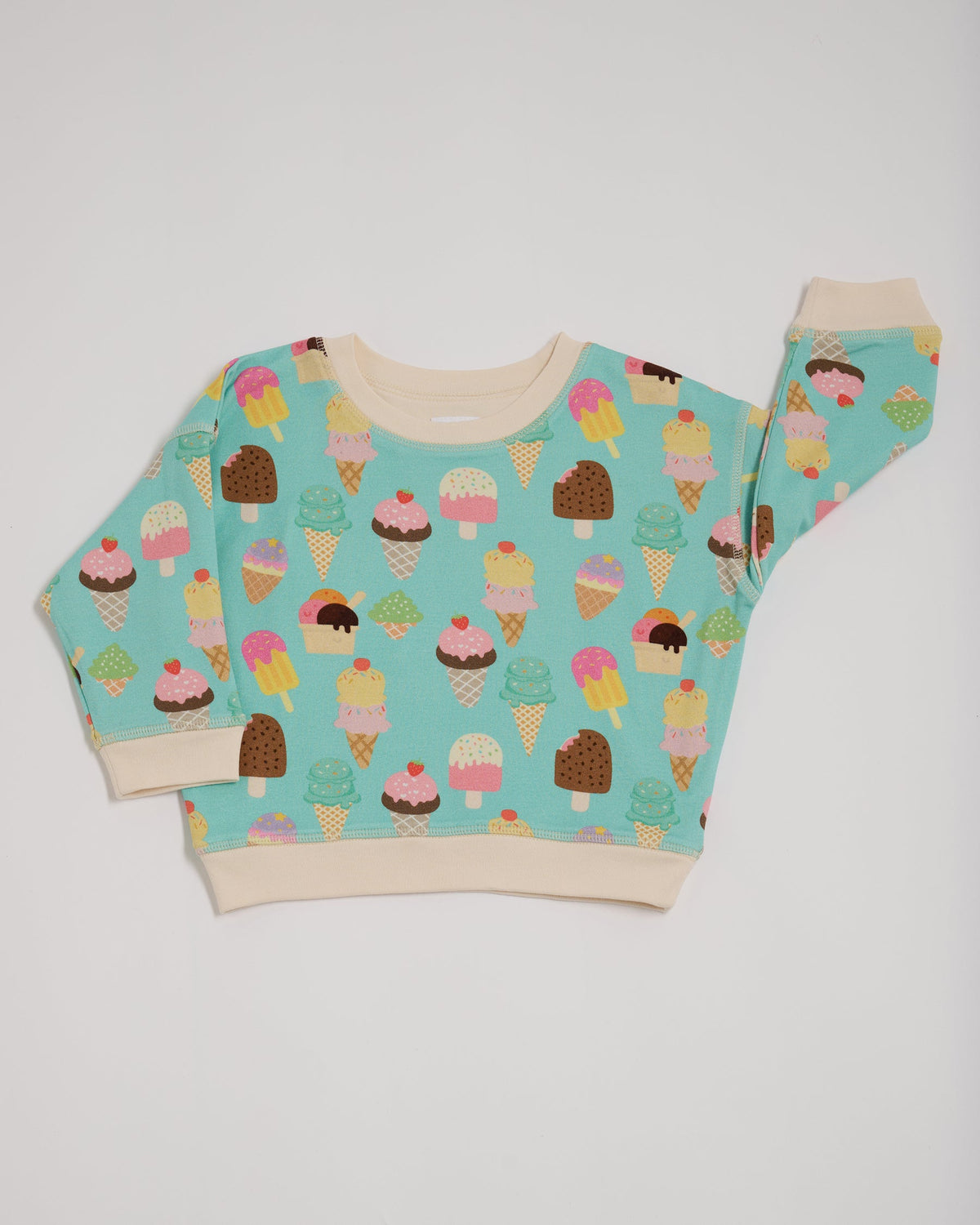 Front of sweatshirt featuring an all over turquoise ice cream print with contrast vanilla neck and sleeve trim.