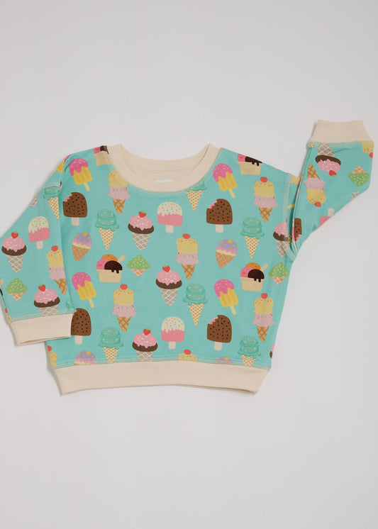 Front of sweatshirt featuring an all over turquoise ice cream print with contrast vanilla neck and sleeve trim.