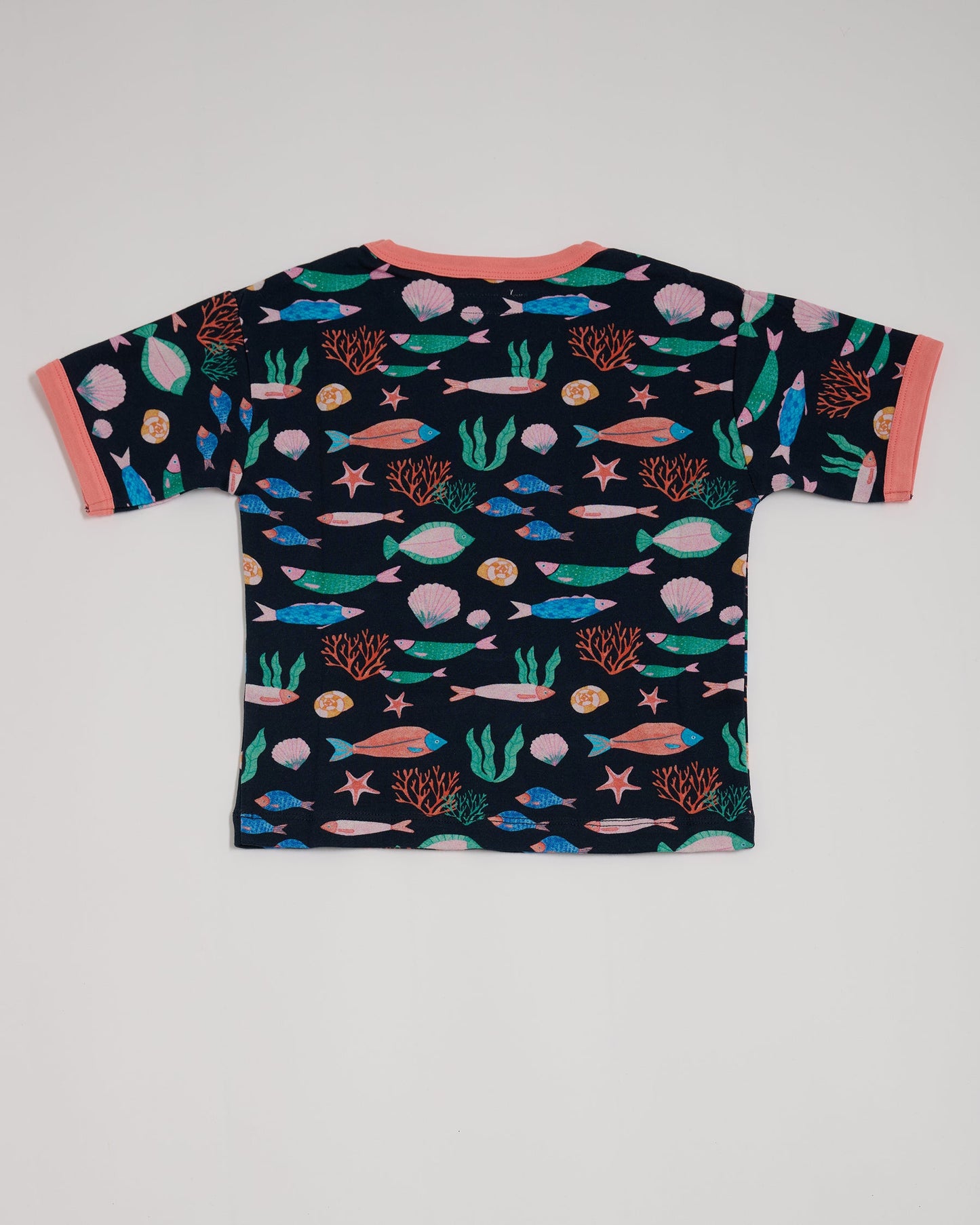 Back of short sleeved t-shirt featuring an all over vibrant navy fish print with contrast coral neck and sleeve trim.