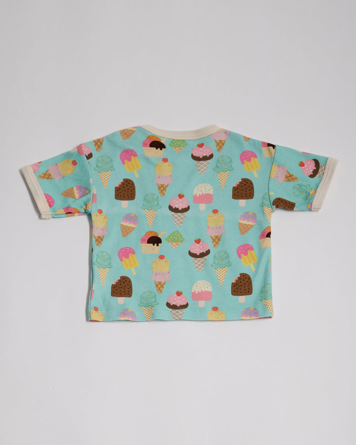 Back of short sleeved t-shirt featuring an all over turquoise ice cream print with contrast ecru neck and sleeve trim.