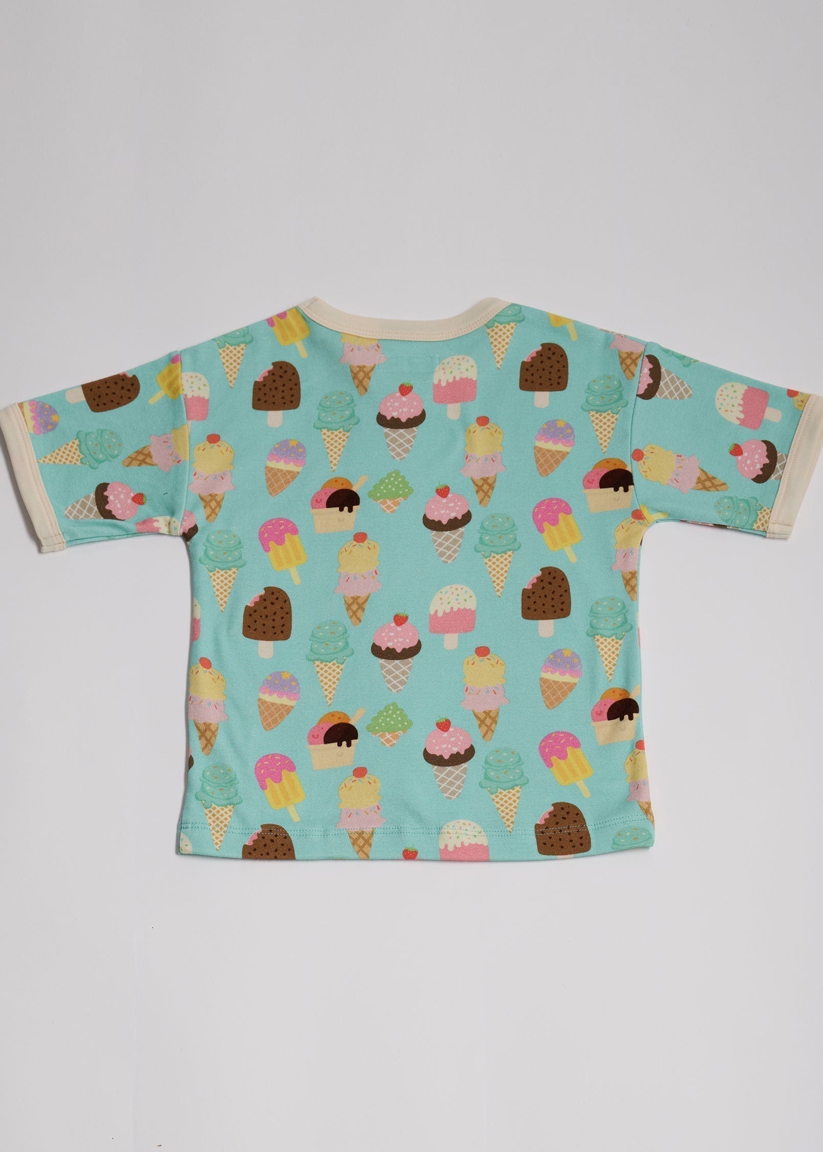 Back of short sleeved t-shirt featuring an all over turquoise ice cream print with contrast ecru neck and sleeve trim.