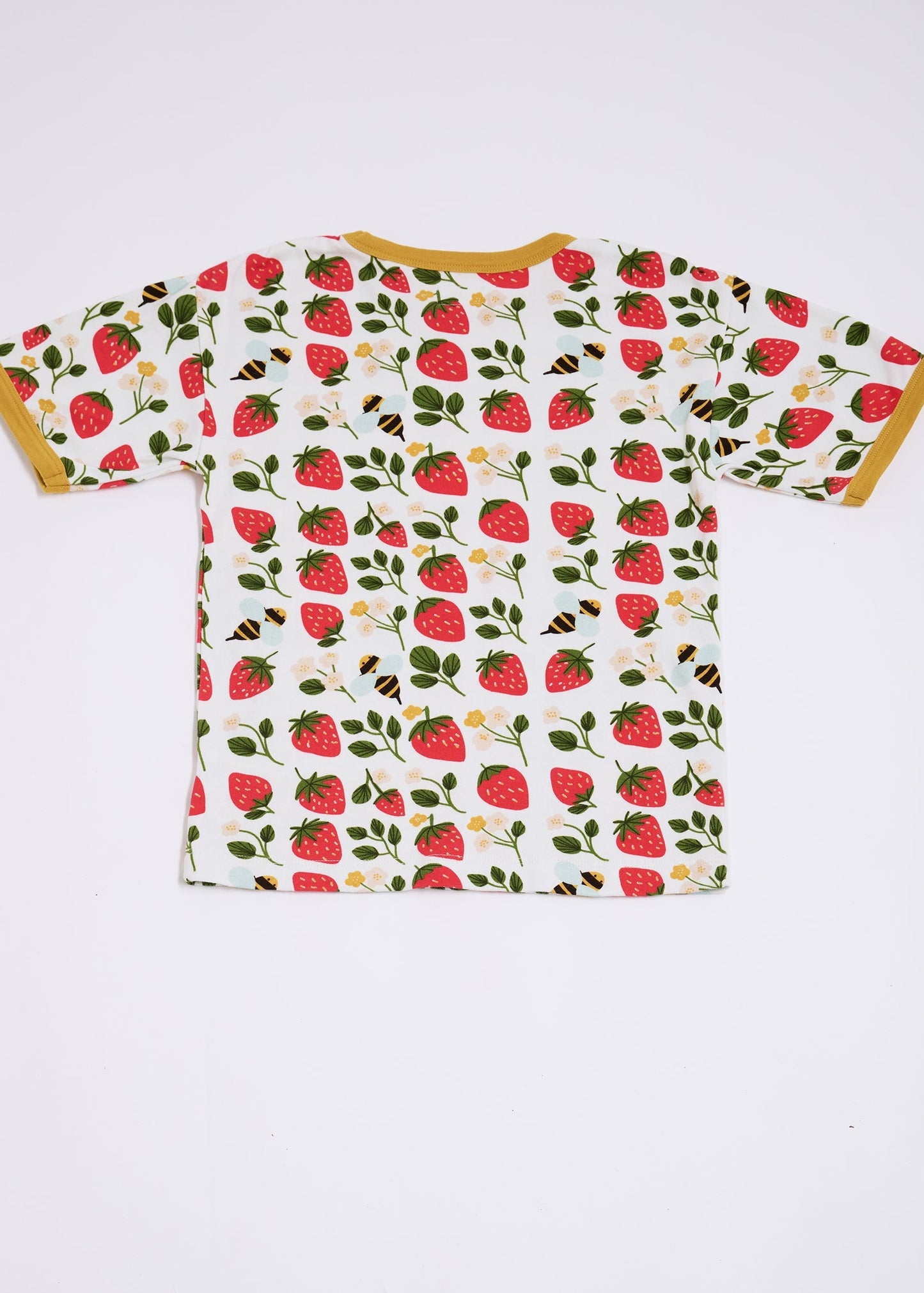 Back of short sleeved t-shirt featuring an all over strawberry and bees print with contrast honey neck and sleeve trim.