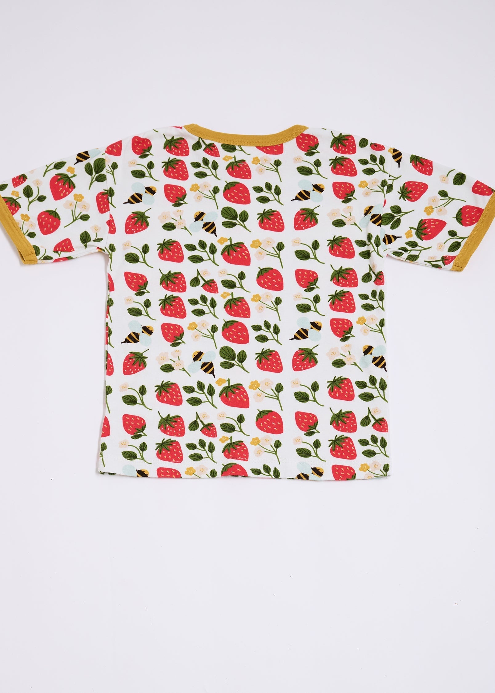 Back of short sleeved t-shirt featuring an all over strawberry and bees print with contrast honey neck and sleeve trim.