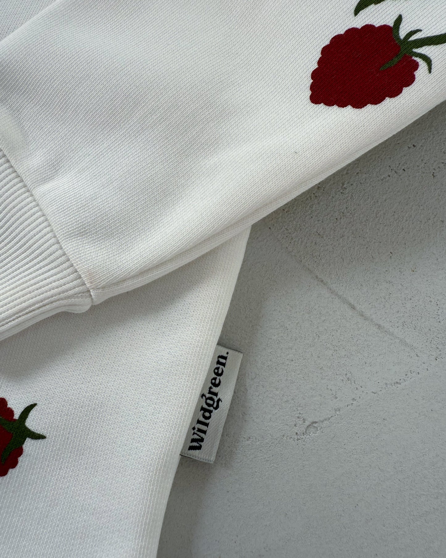 Wildgreen raspberry print long-sleeve sweater made from 100% organic undyed cotton. Unisex sustainable kidswear