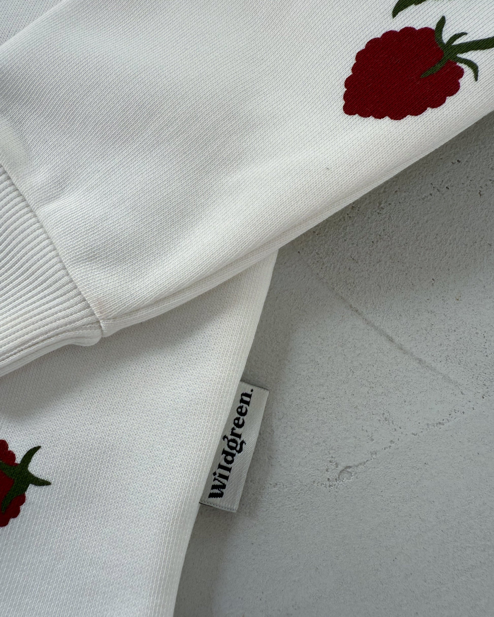 Wildgreen raspberry print long-sleeve sweater made from 100% organic undyed cotton. Unisex sustainable kidswear